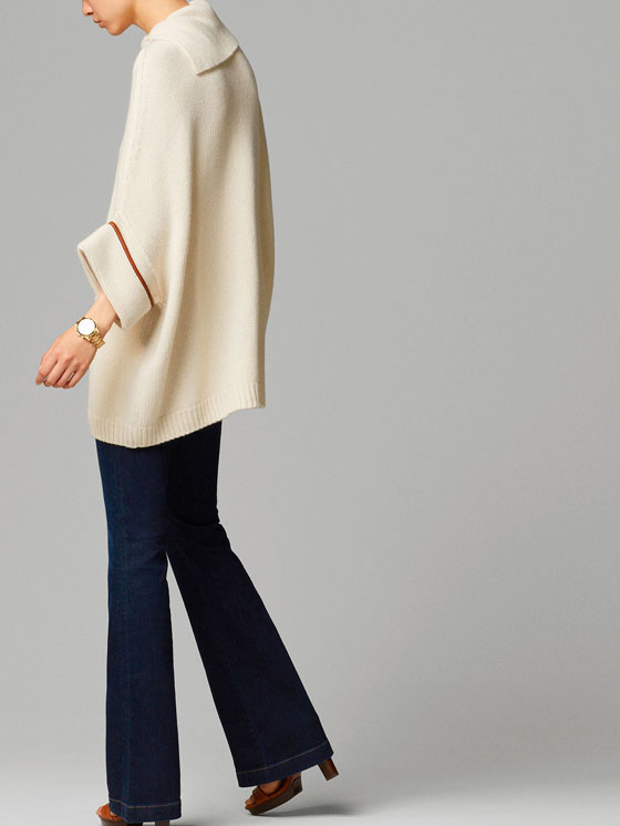 CAPA PONCHO DETALHES PELE