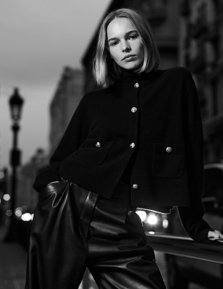 Blonde white woman wears Massimo Dutti in black and white photo