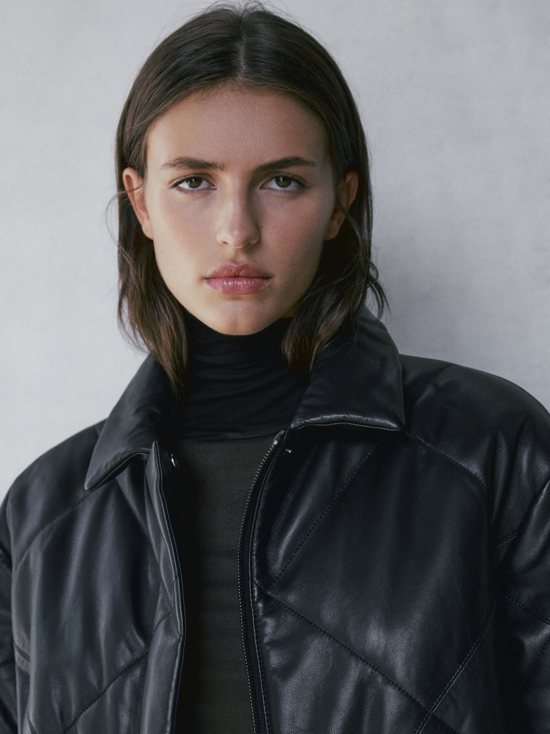 black quilted jacket with belt