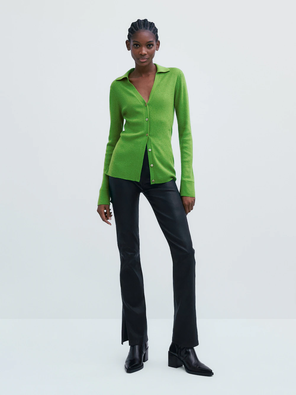 Massimo Dutti new season lime green ribbed v-neck sweater with buttons. It is a long line to the hip and fits close to the body and has long sleeves. 