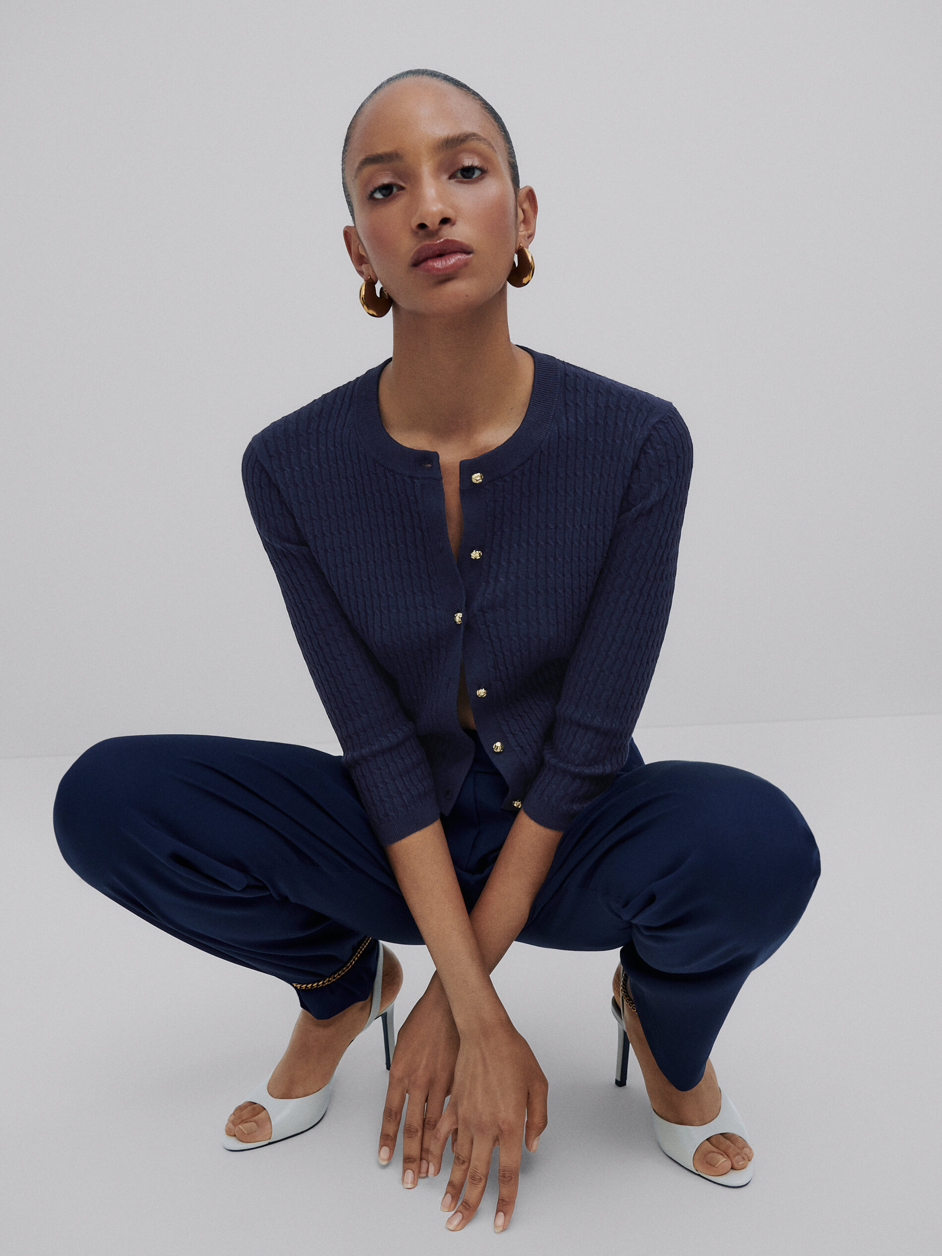 Cable-knit cardigan with gold buttons 