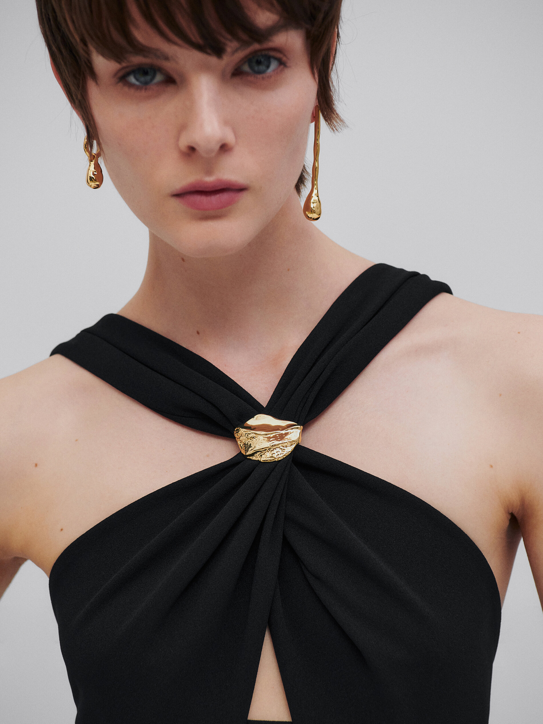 Long halter dress with criss-cross neck 