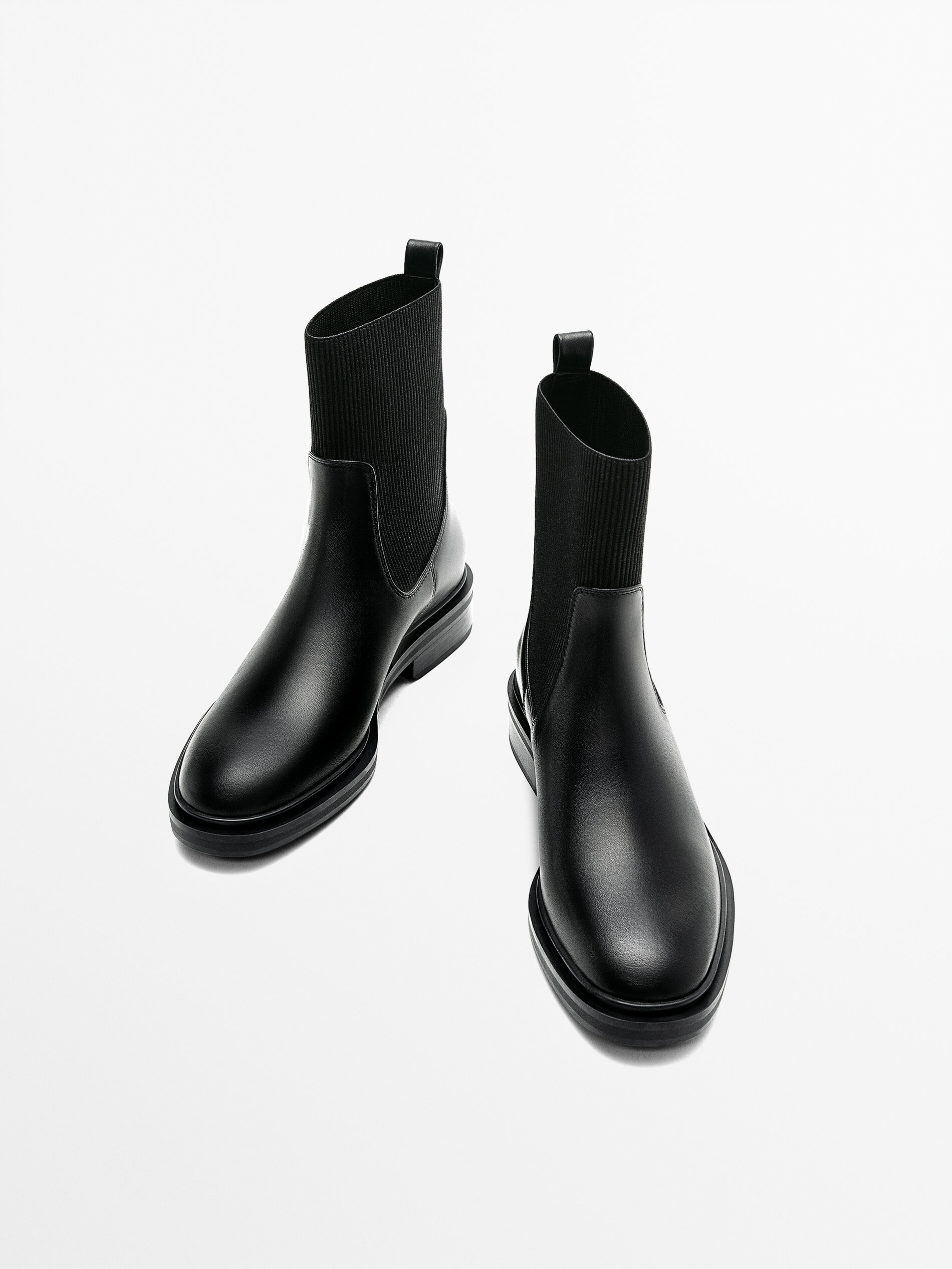 Black stretch leather ankle boots