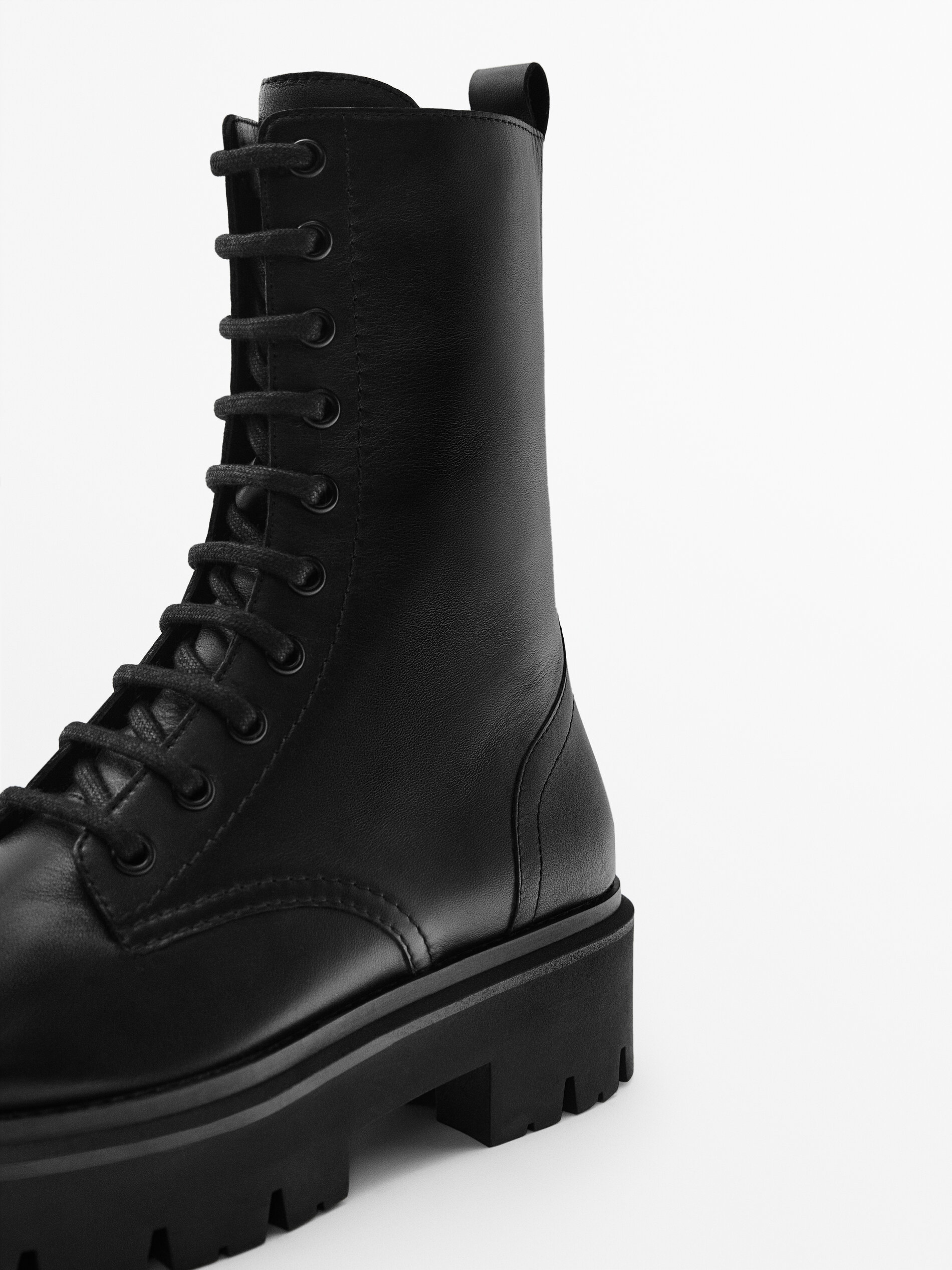Leather lace-up ankle boots with track
