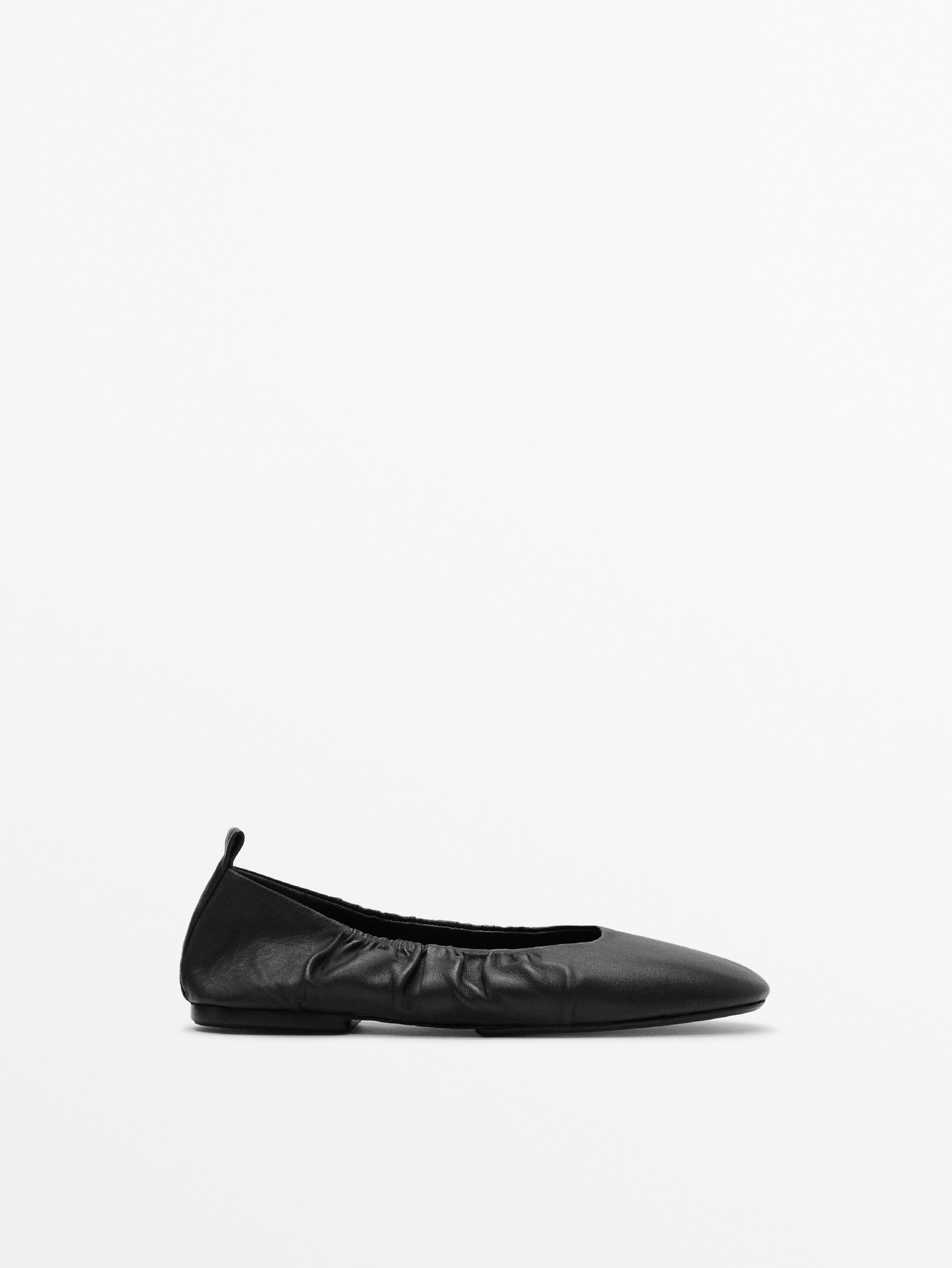 black ballet shoes with white elastic
