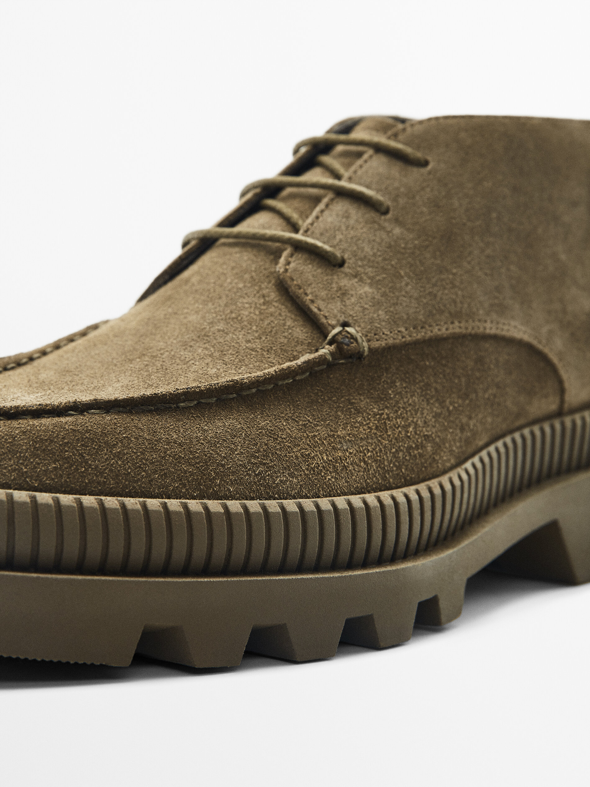 Split suede ankle boots with track 