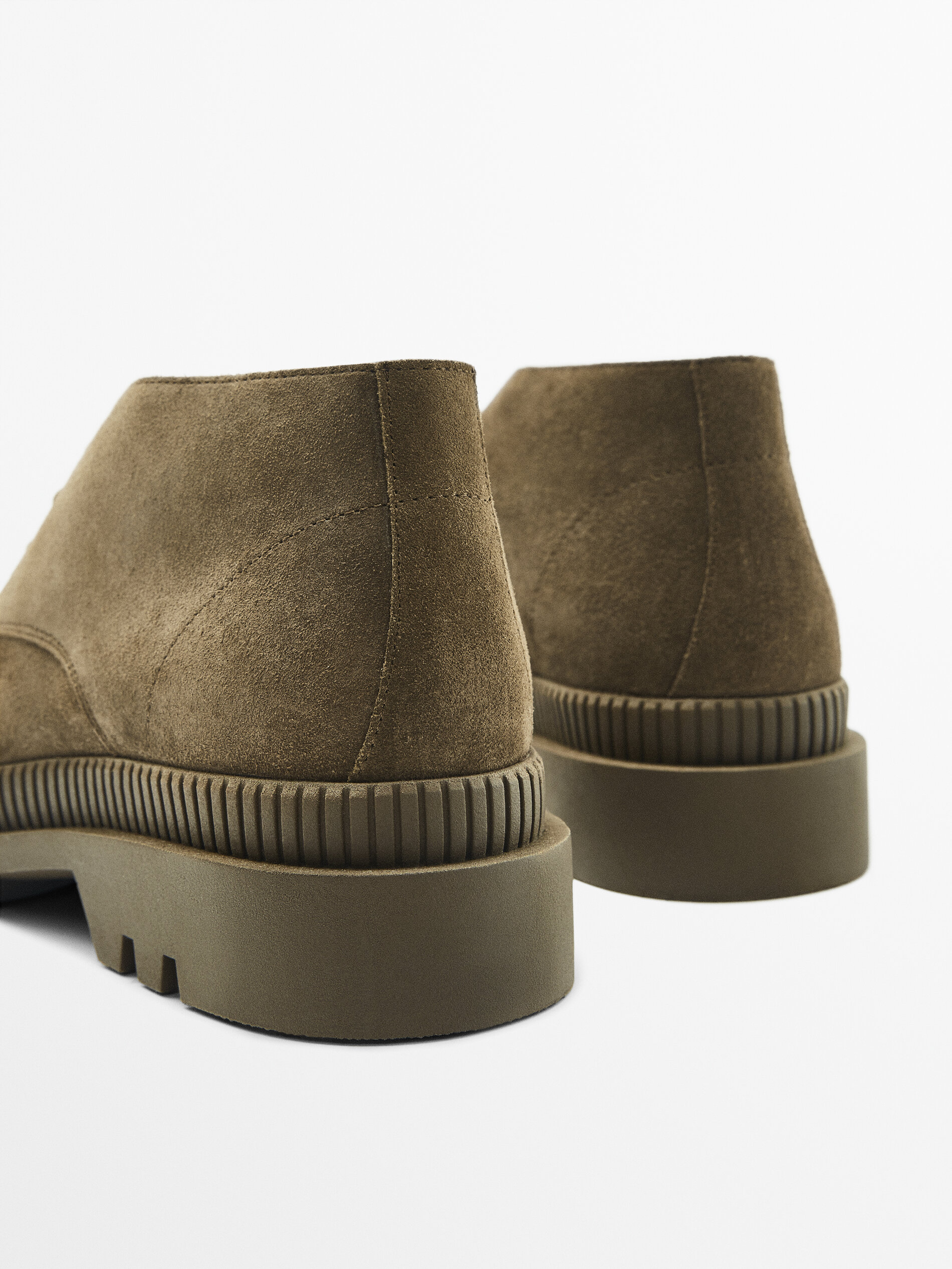 Split suede ankle boots with track 