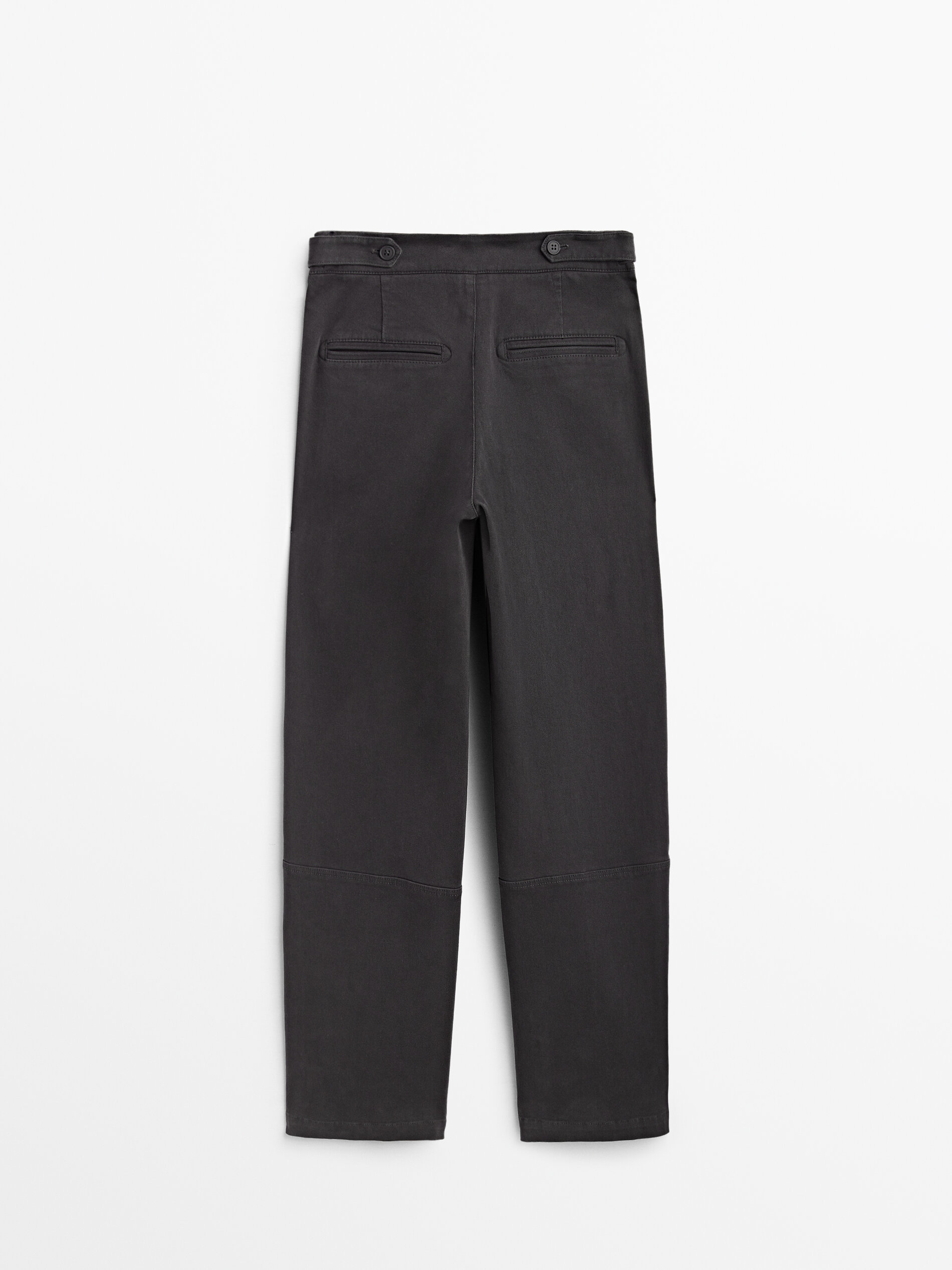 High-waist trousers with buckles at the 