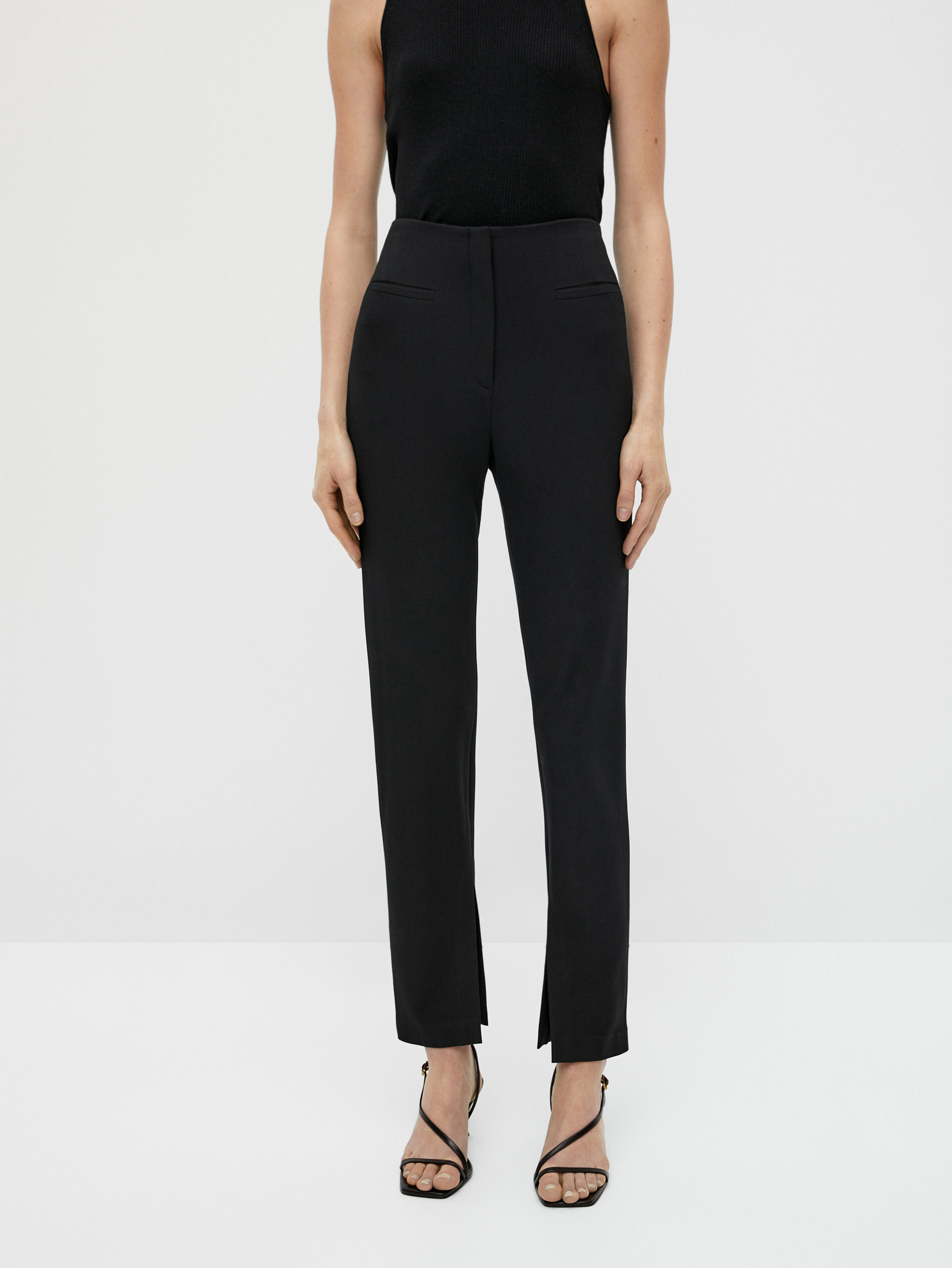 Skinny trousers with slit details 