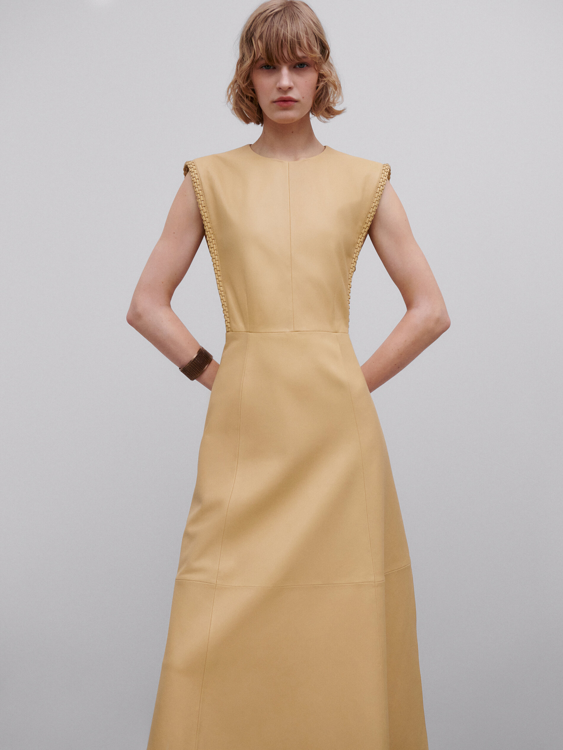 Leather dress with braided detail 