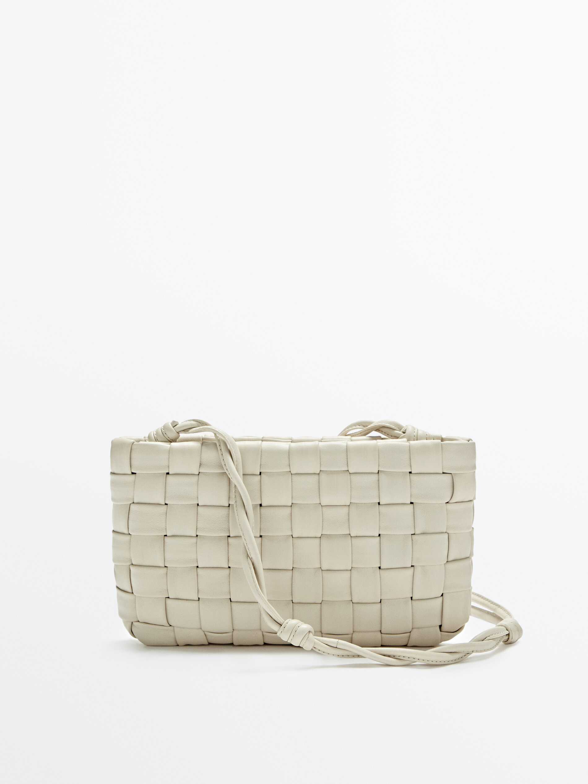 white woven clutch