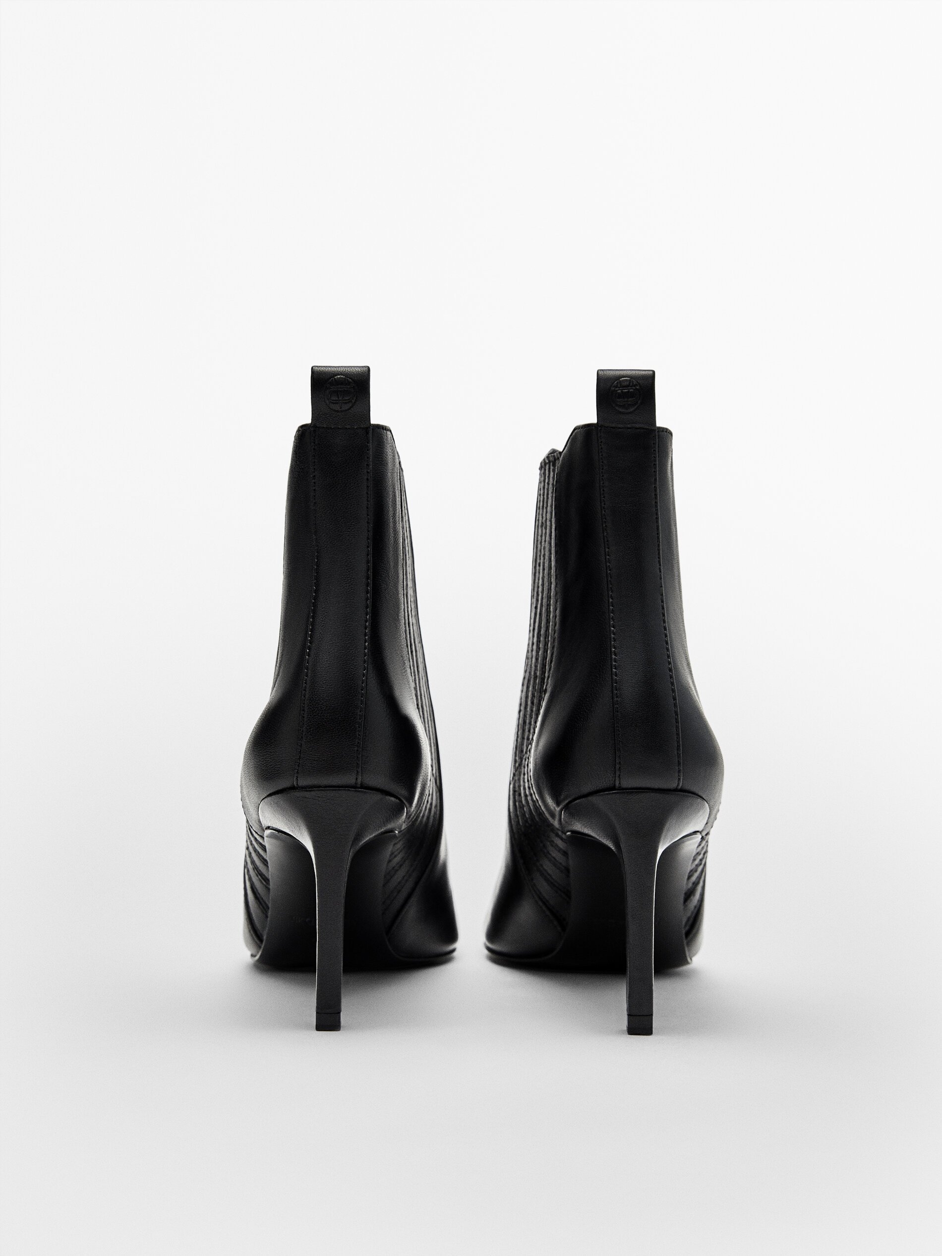 elastic heeled booties