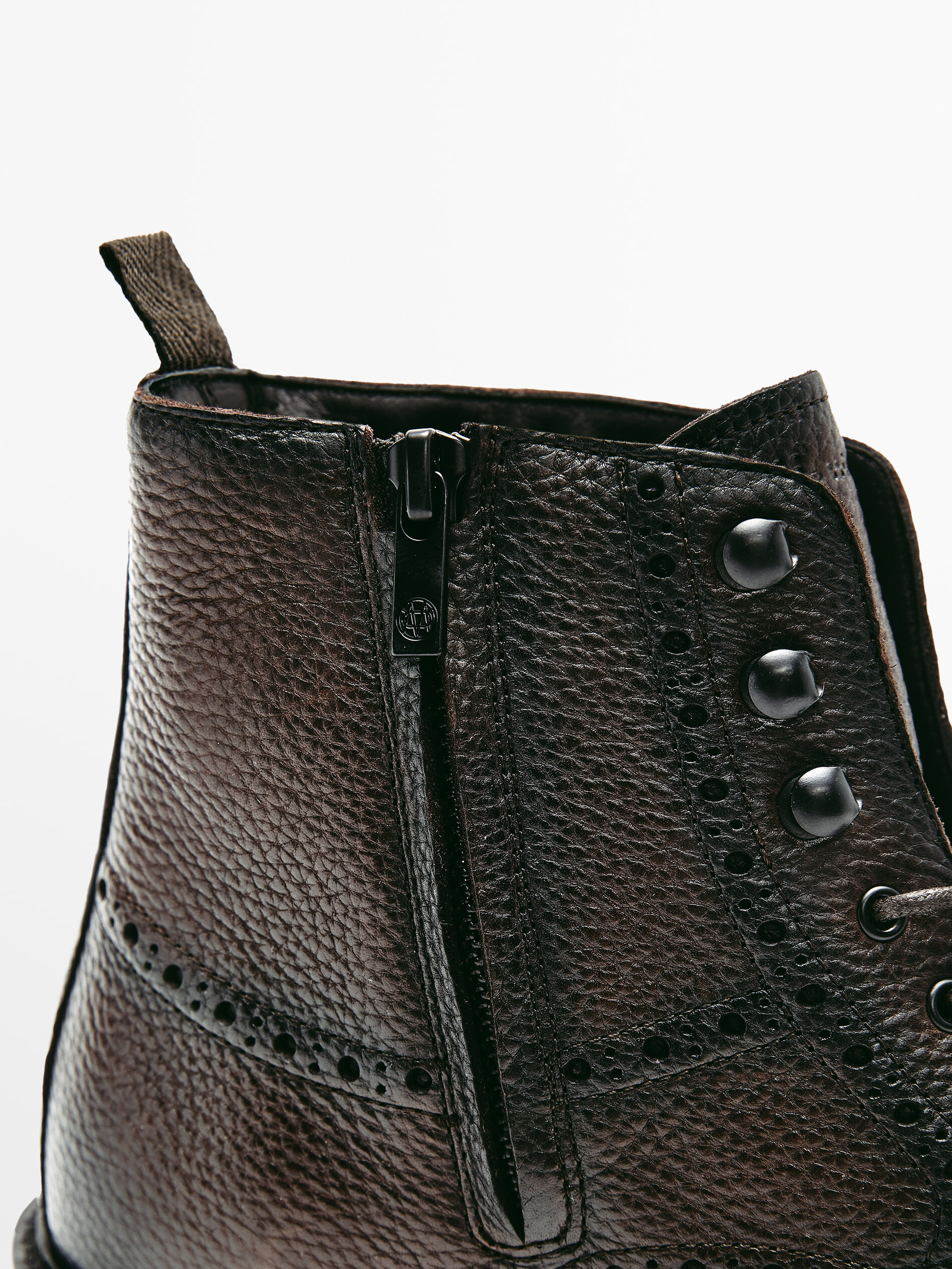 perforated ankle boots