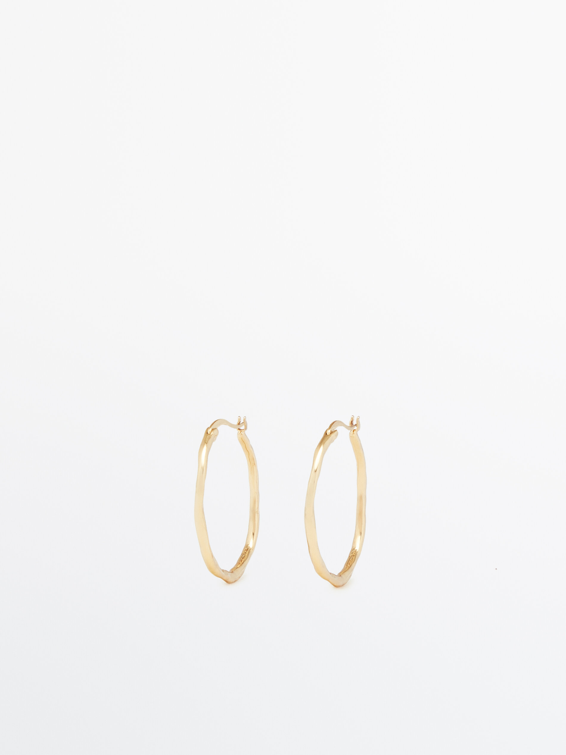 Gold plated coarse textured hoop earrings Golden Accessories