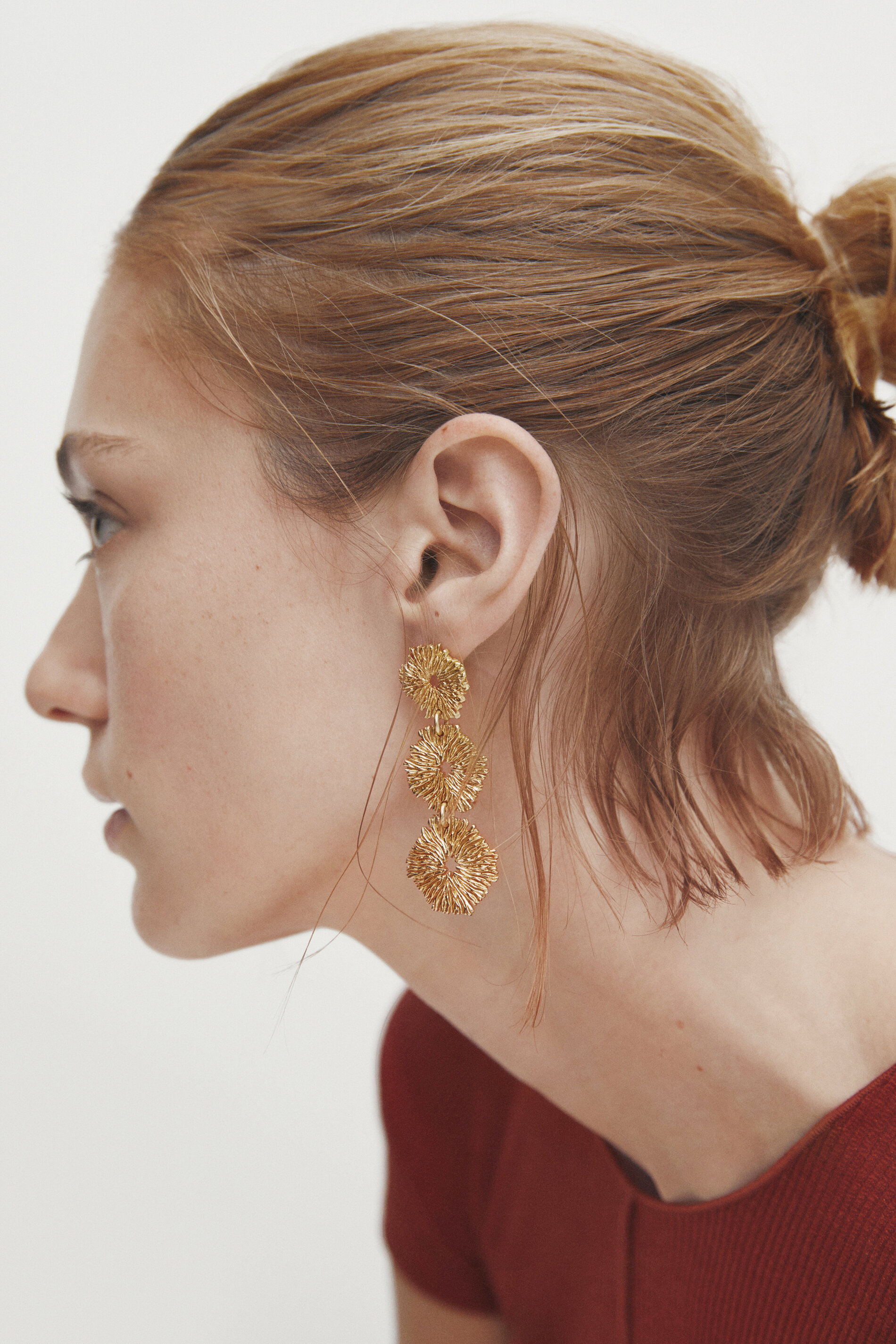 Gold plated triple flower long earrings Golden Accessories