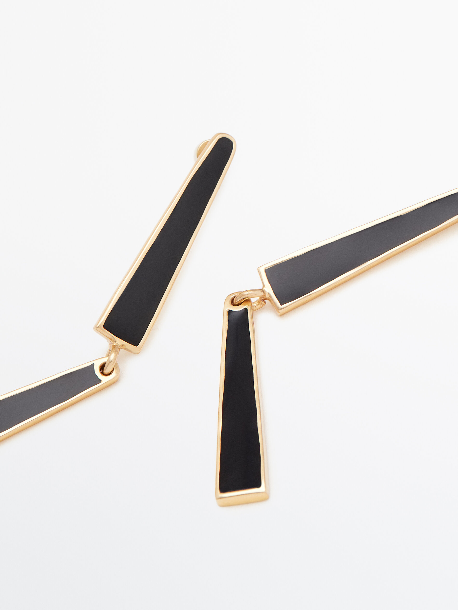 Gold plated dangle earrings with enamel detail