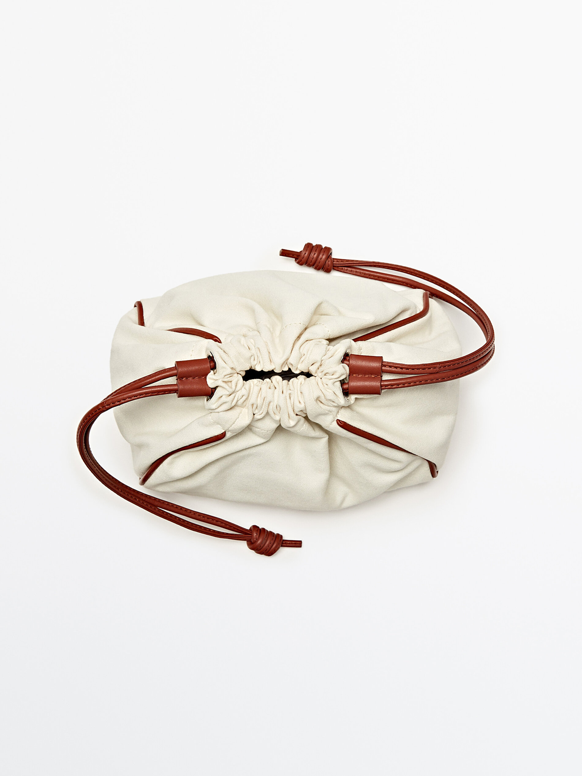 Pouch bag with leather details