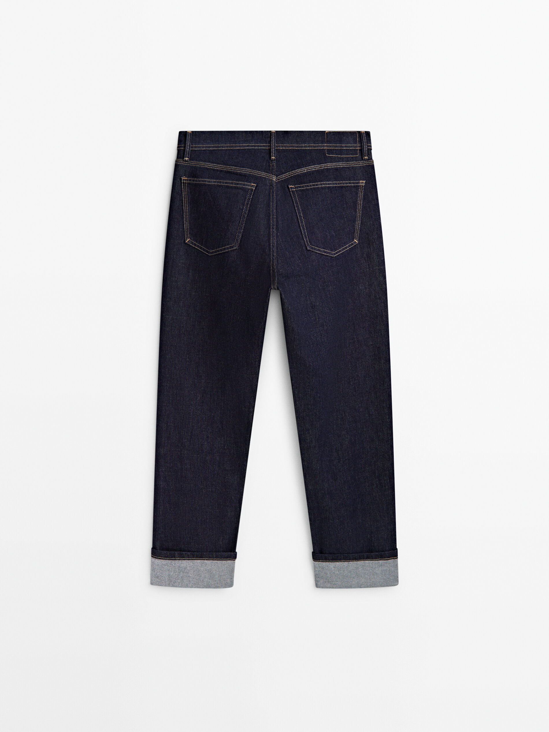 Jeans tiro alto slim straight fit bajo vuelta