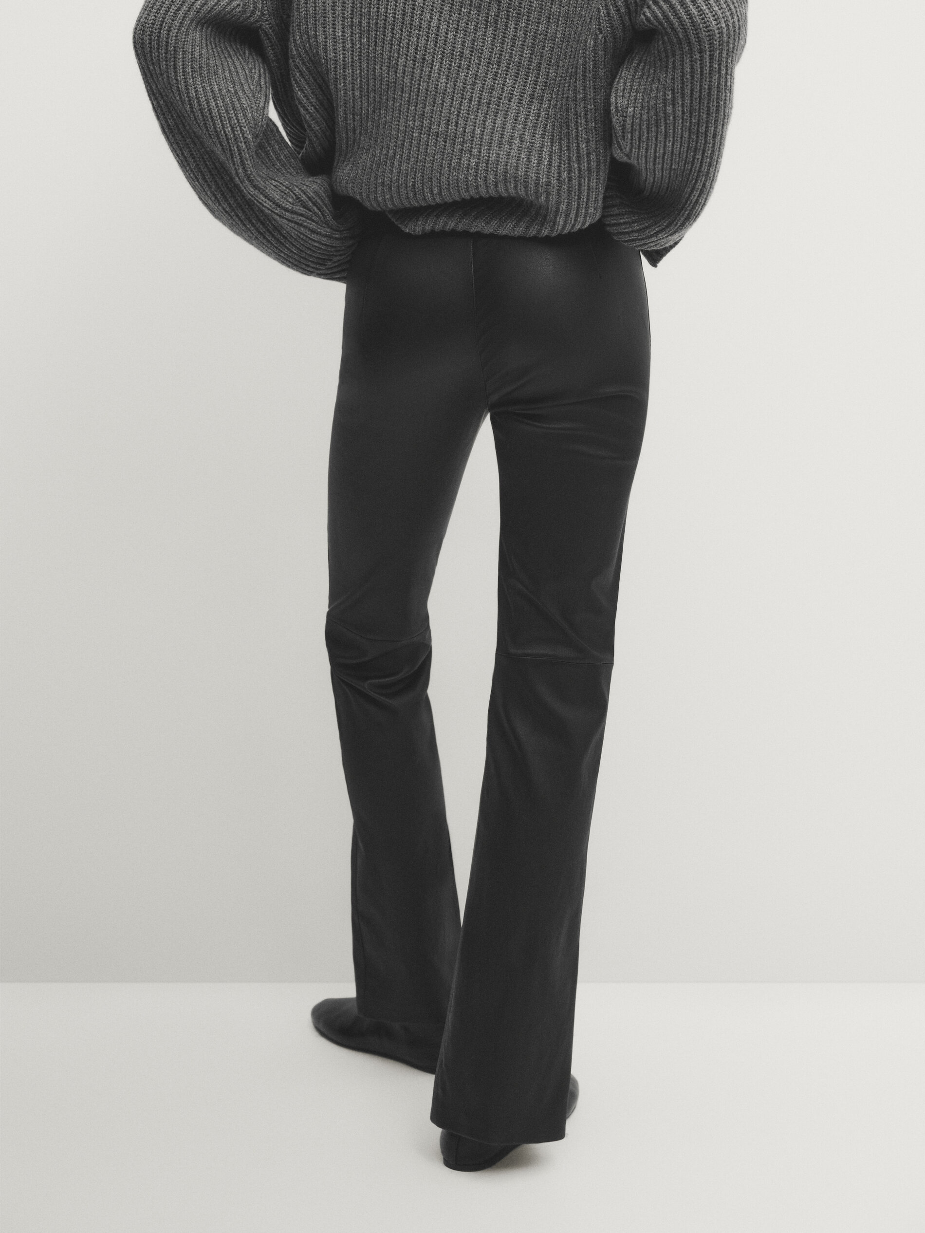 Pantalon noir hotsell fendu en bas
