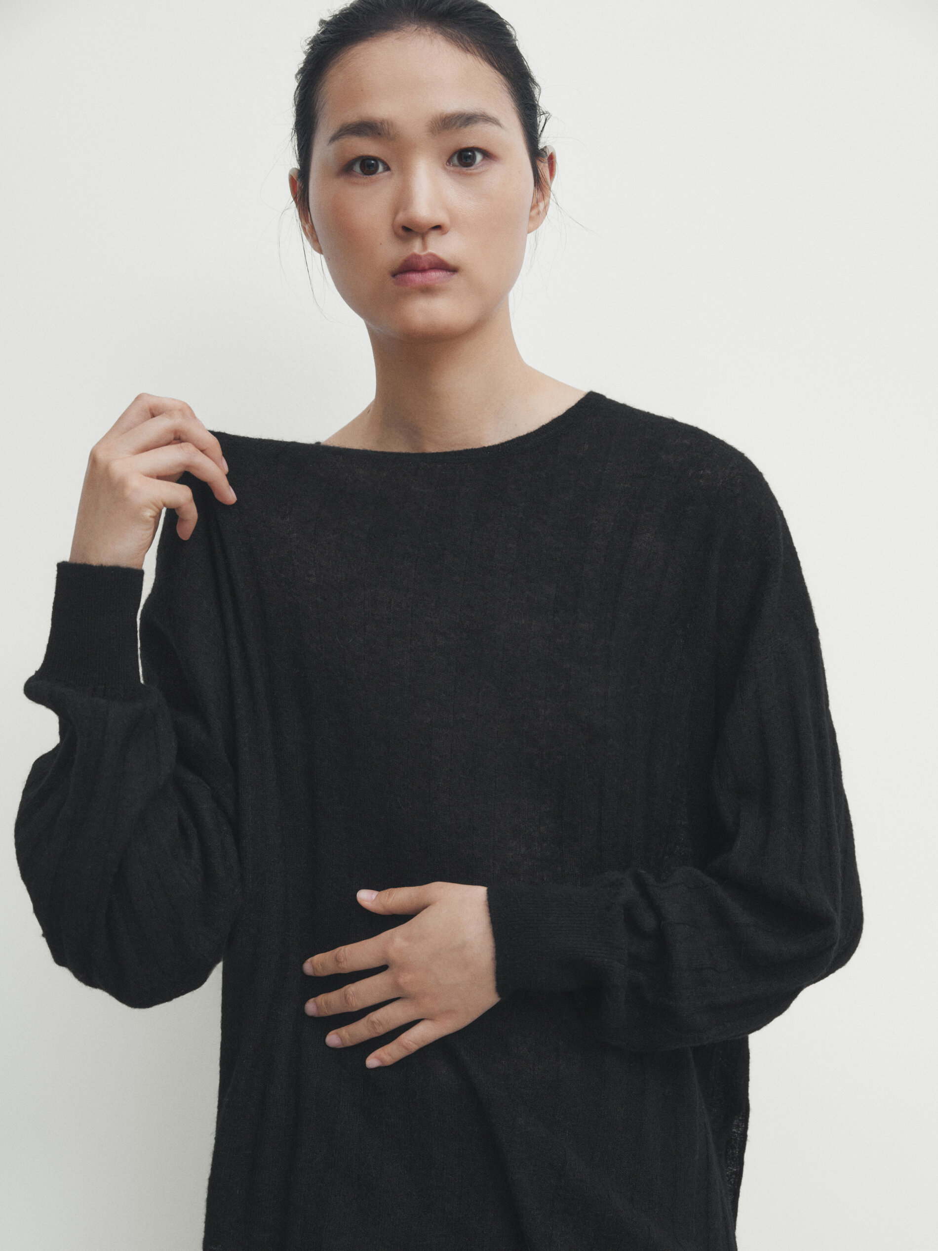 Wide ribbed knit cape sweater