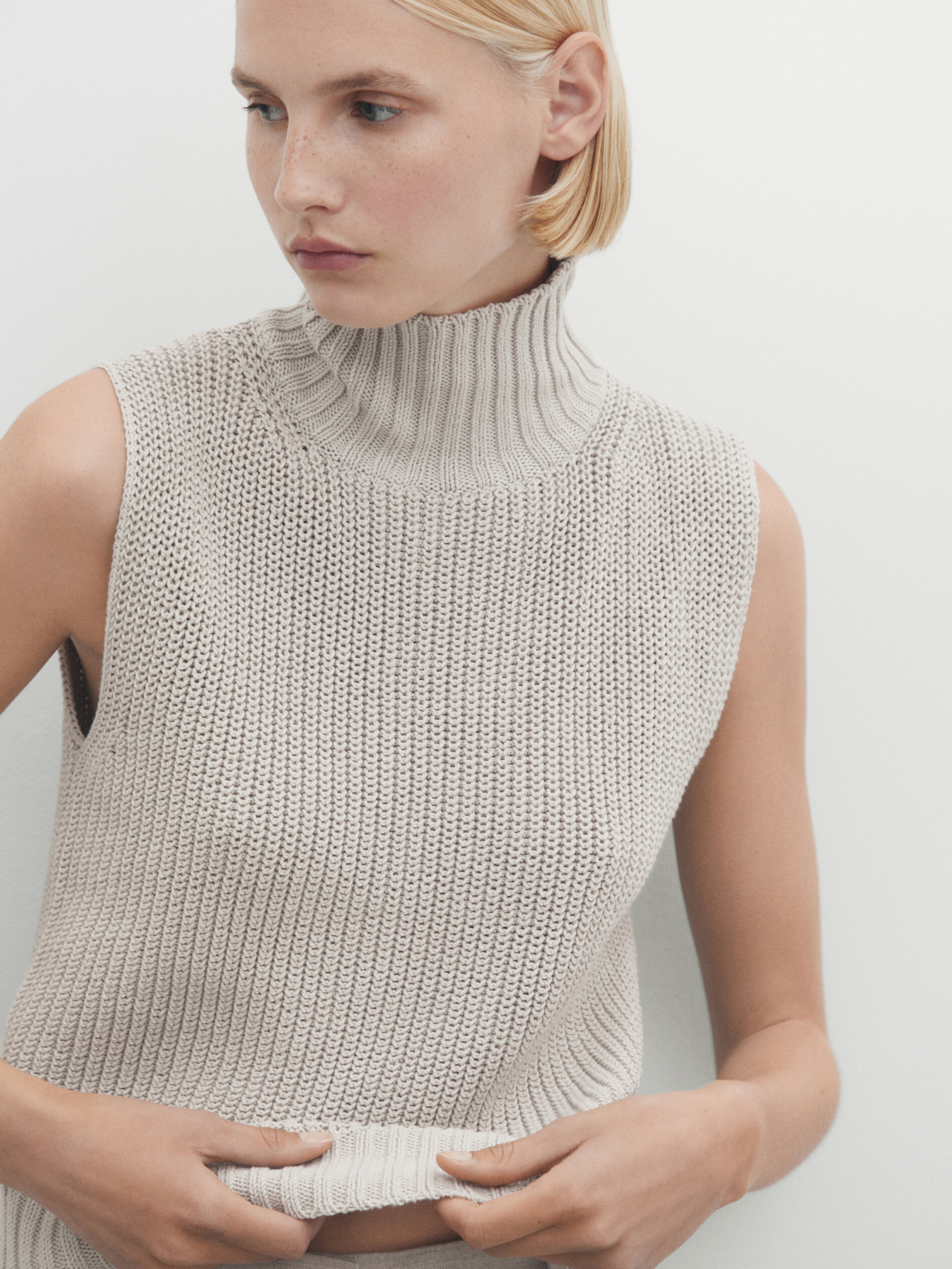 Sleeveless turtleneck sale knit top