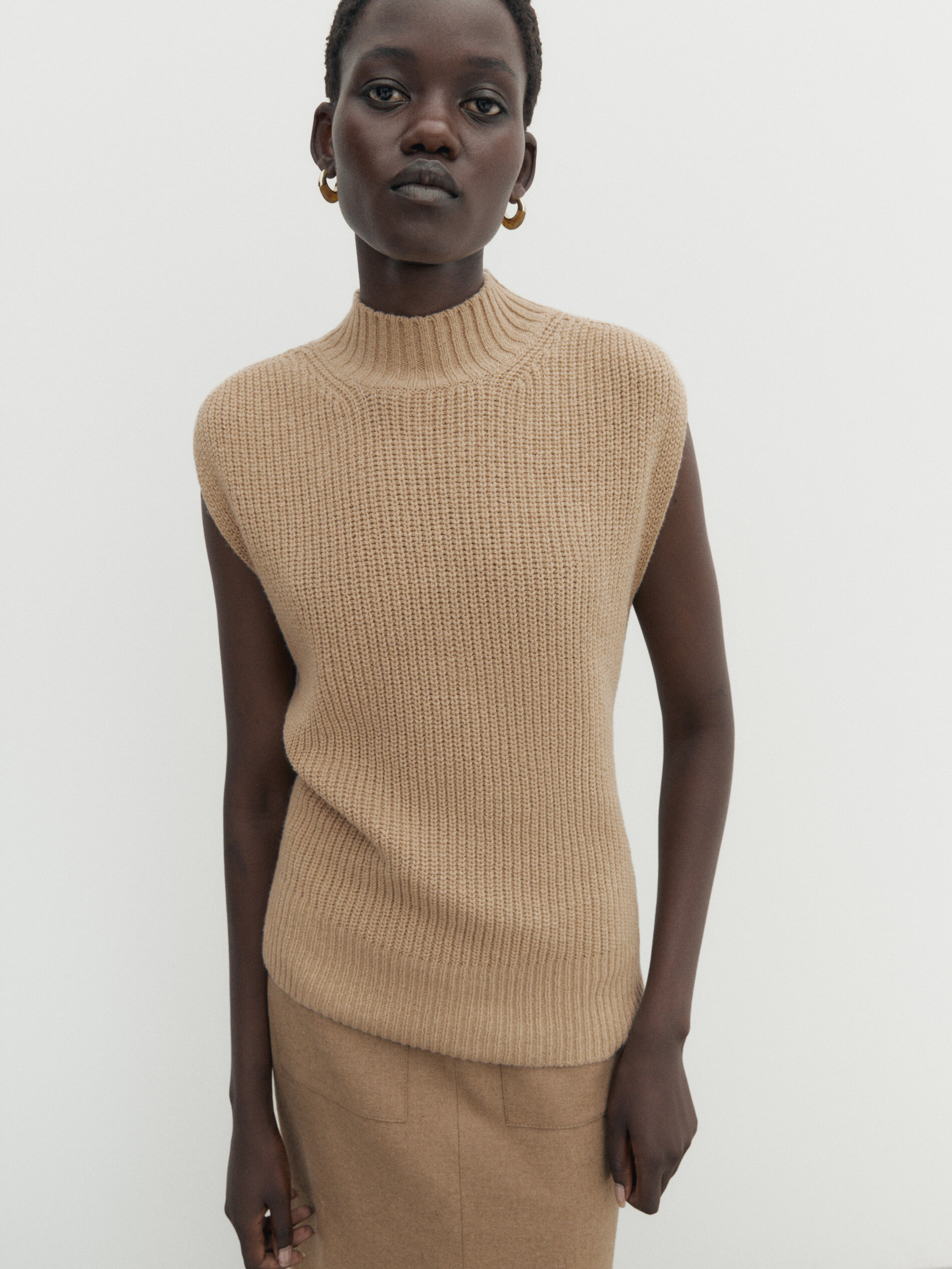 Purl knit mock turtleneck vest Camel Sweaters And Cardigans