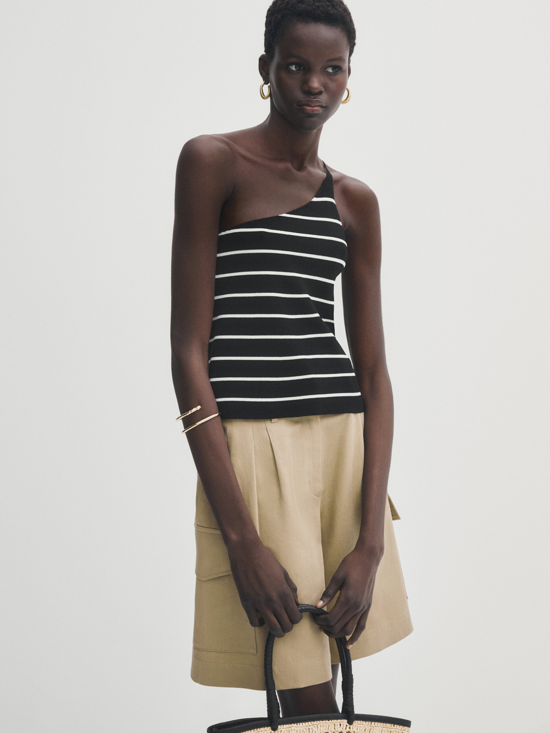 Top in maglia a righe asimmetrico Nero Abiti Eleganti