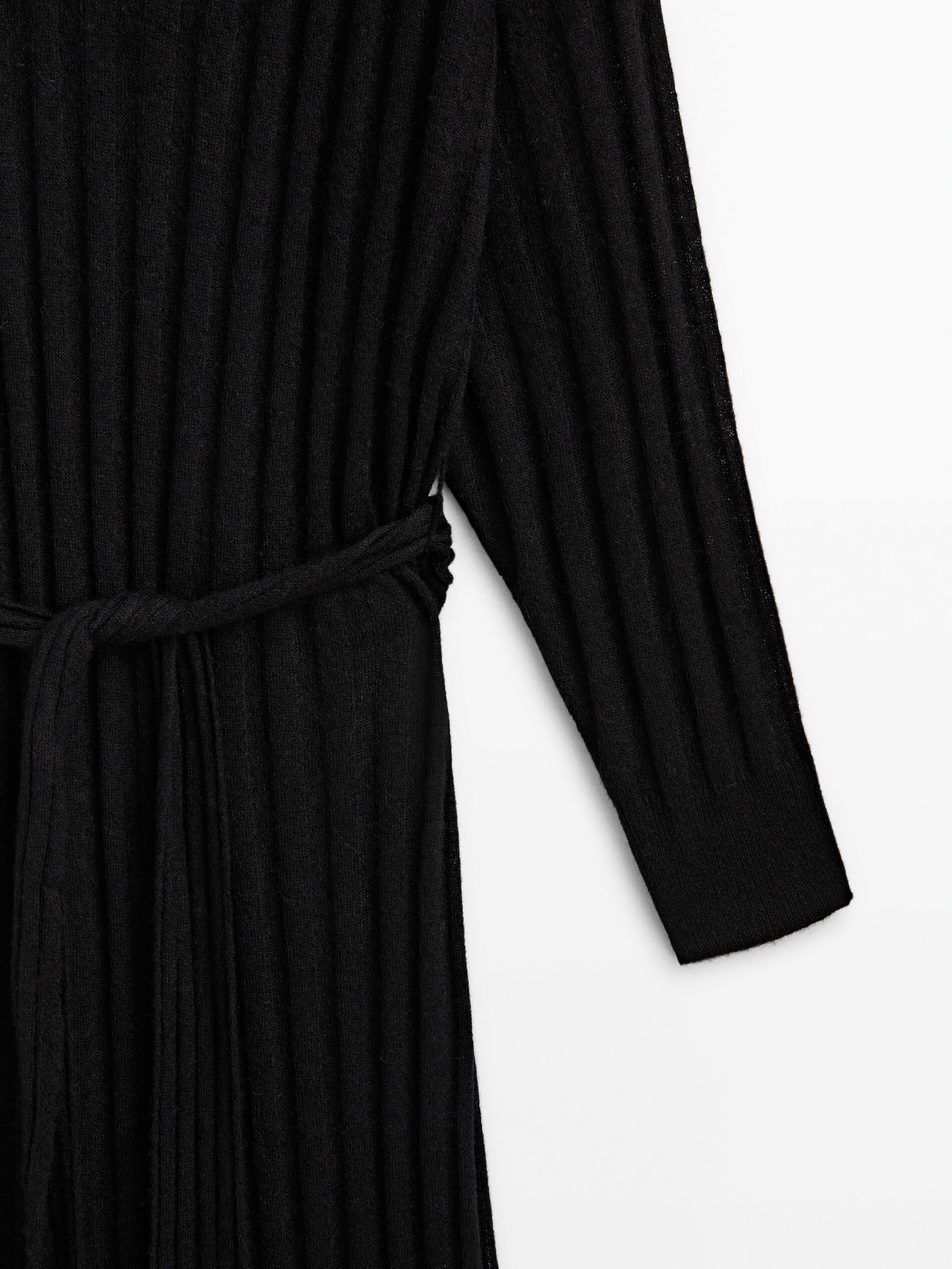 Long ribbed knit sweater with slits