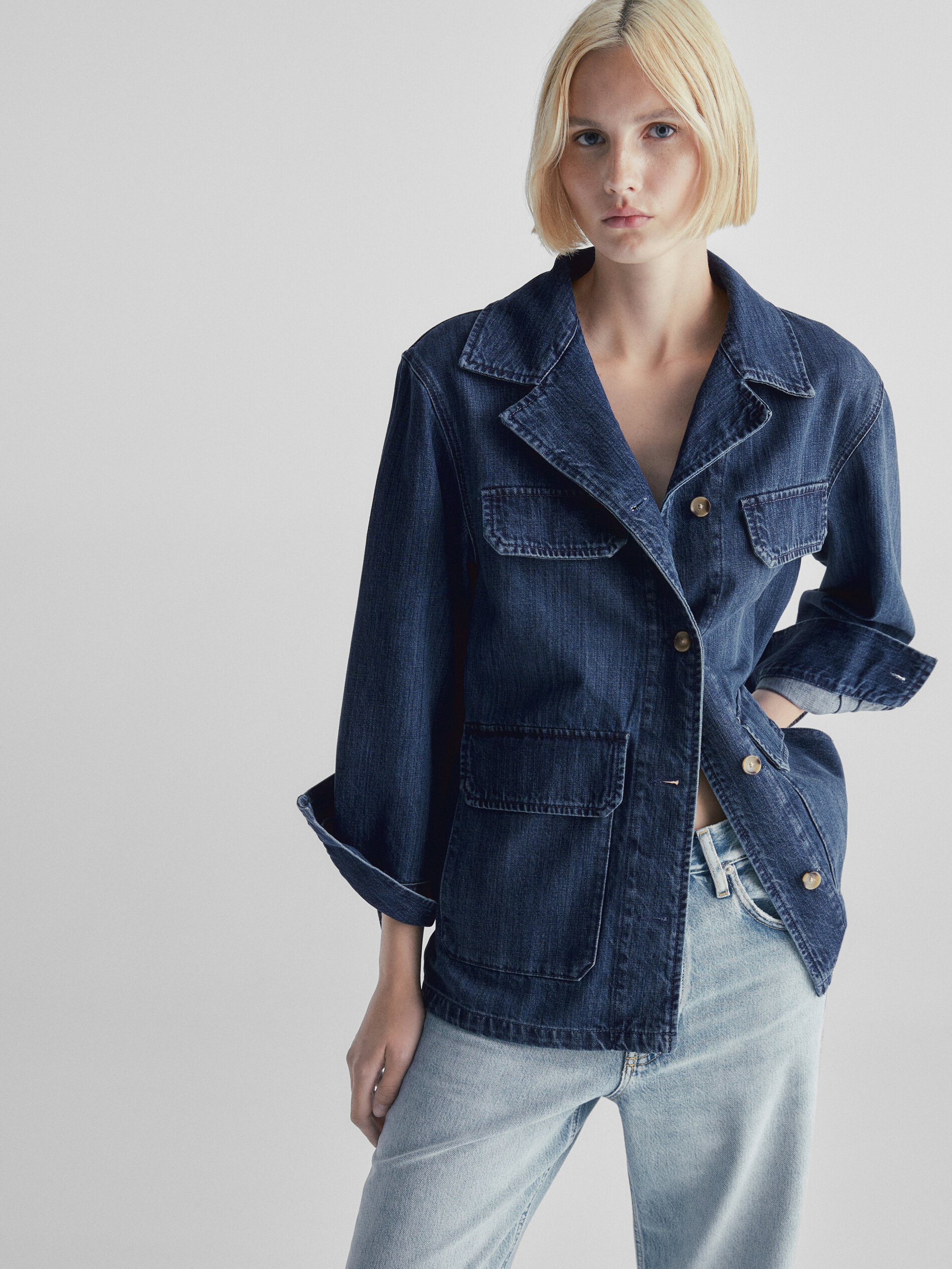 Jeans jacket with clearance belt