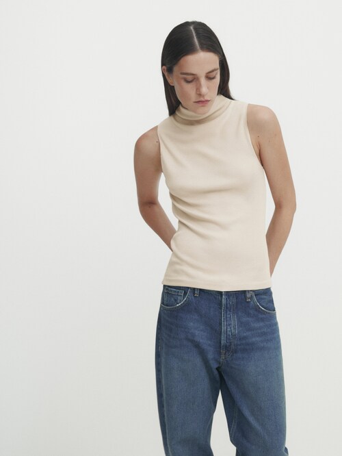 Roll Neck Sleeveless Crop Top In Stone Ribbed Knit