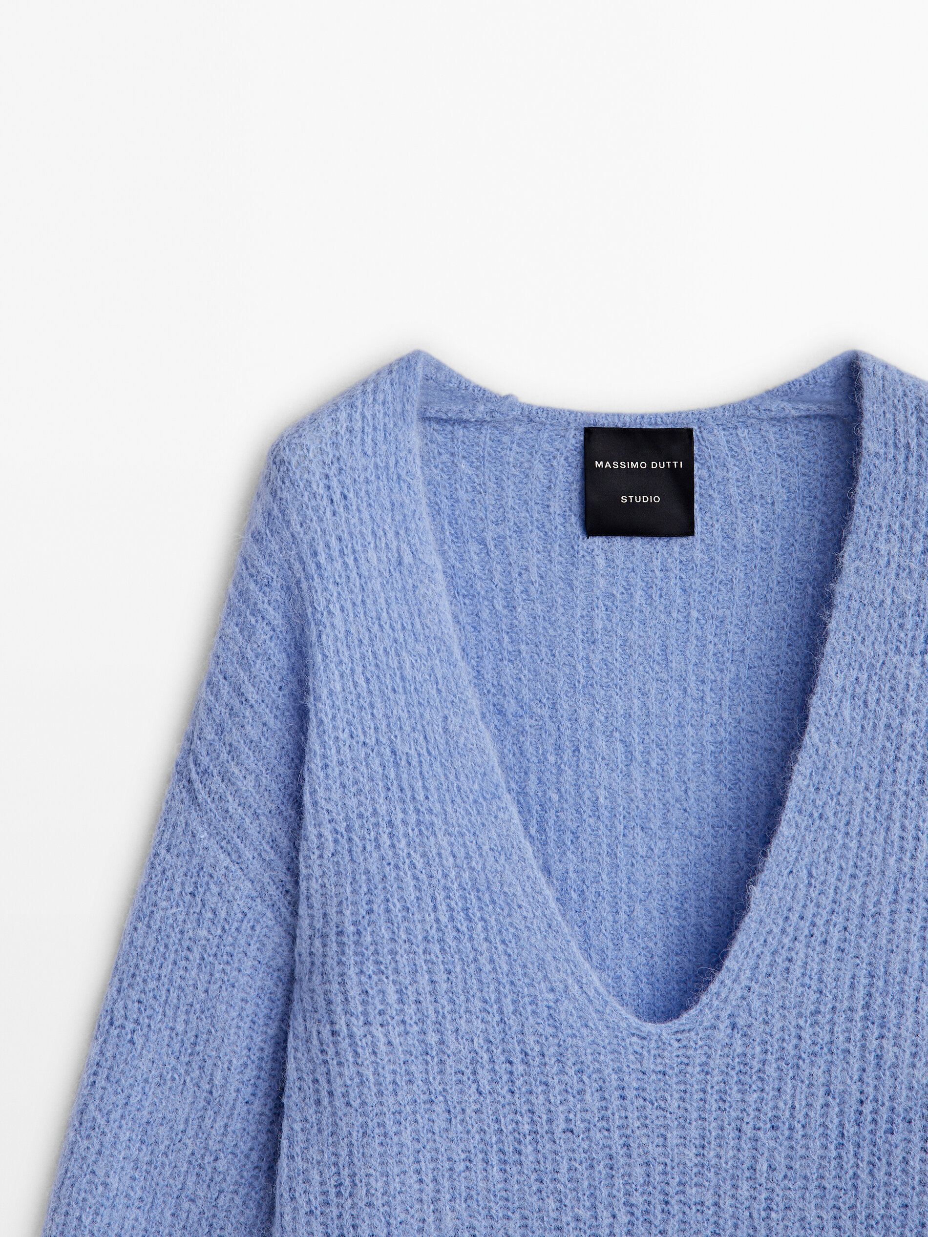 Plunging neckline sweater discount