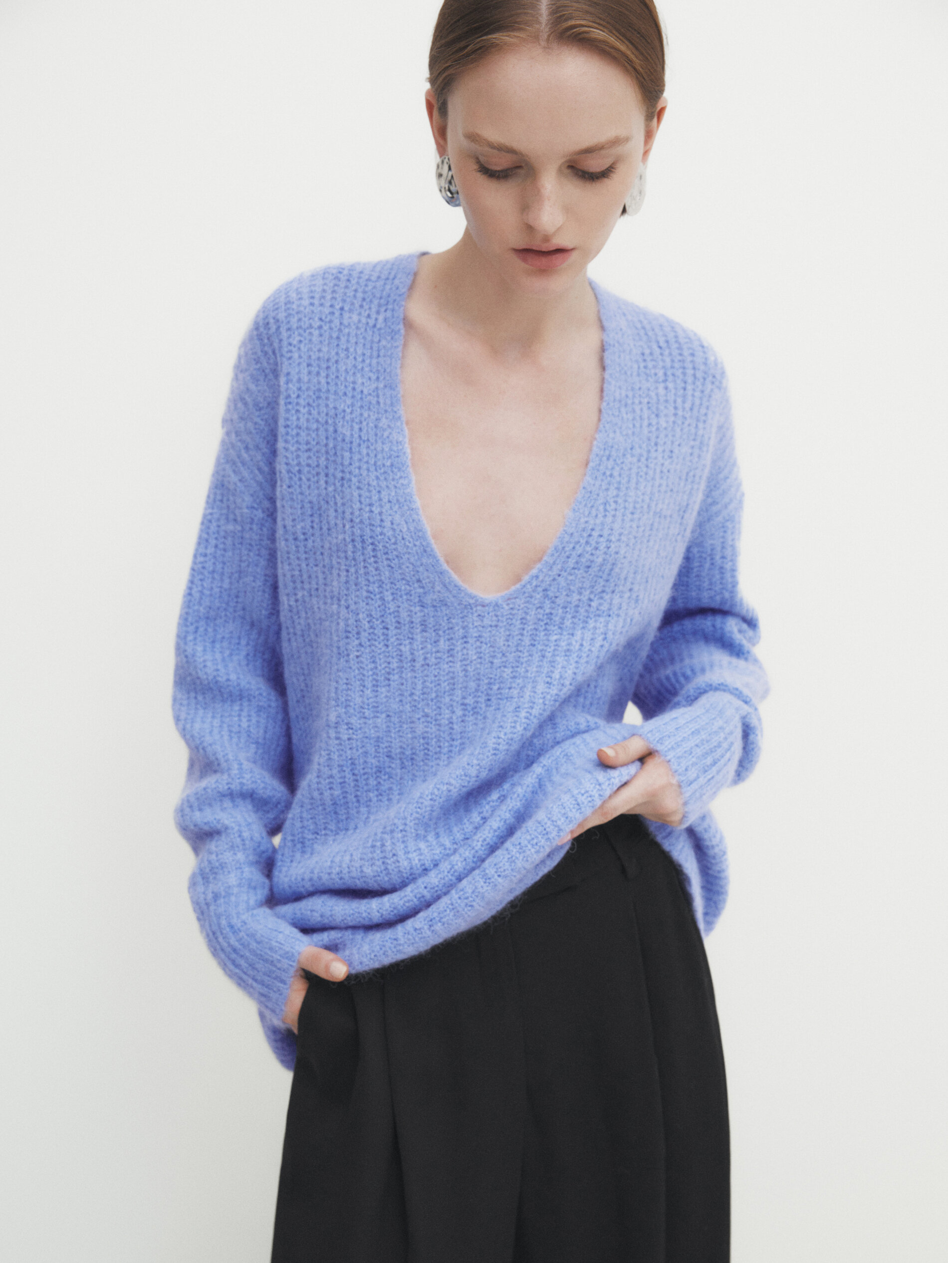 Knit sweater with plunging V neckline Studio