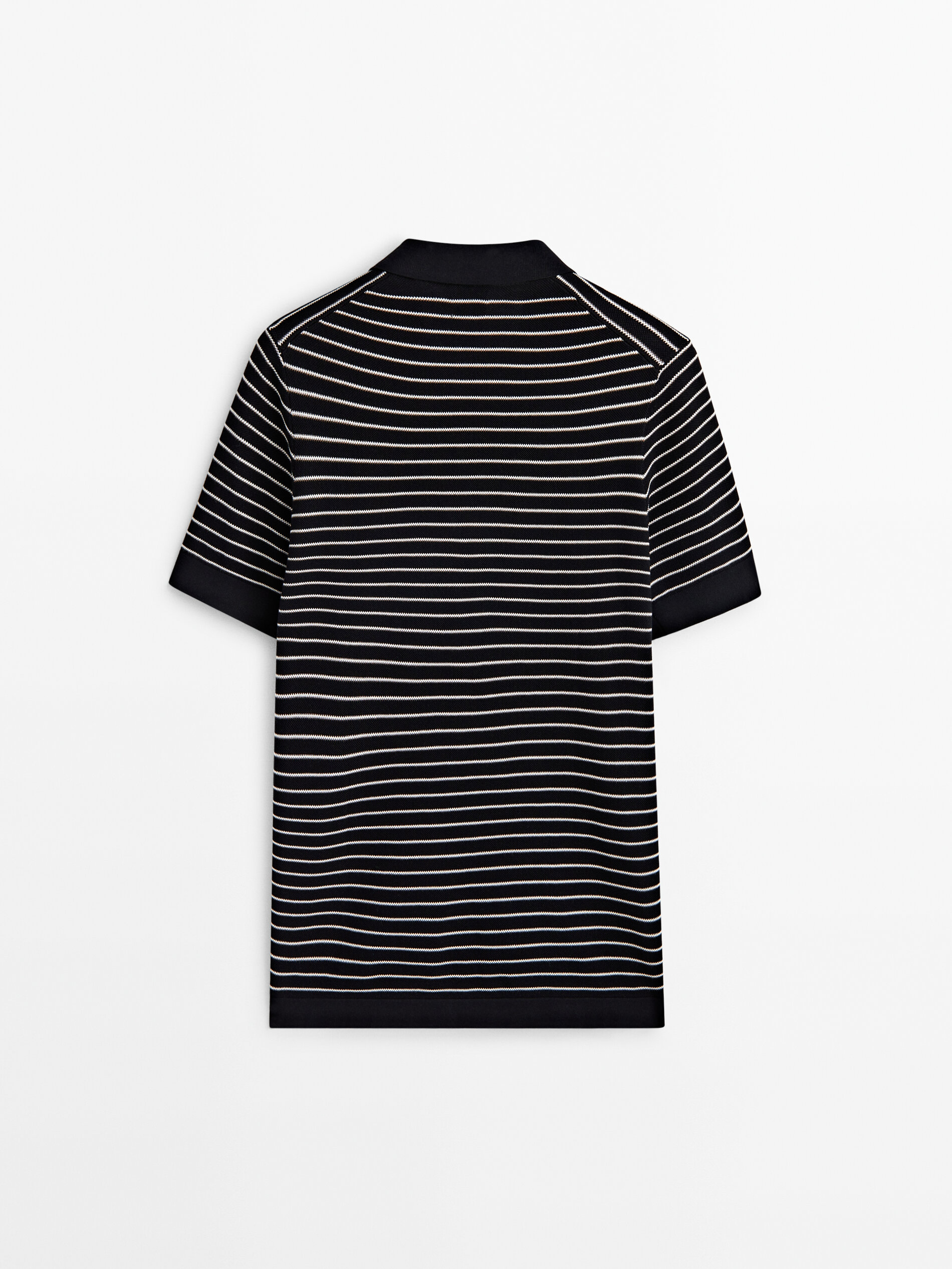 Polo a rayas blanco y hotsell negro