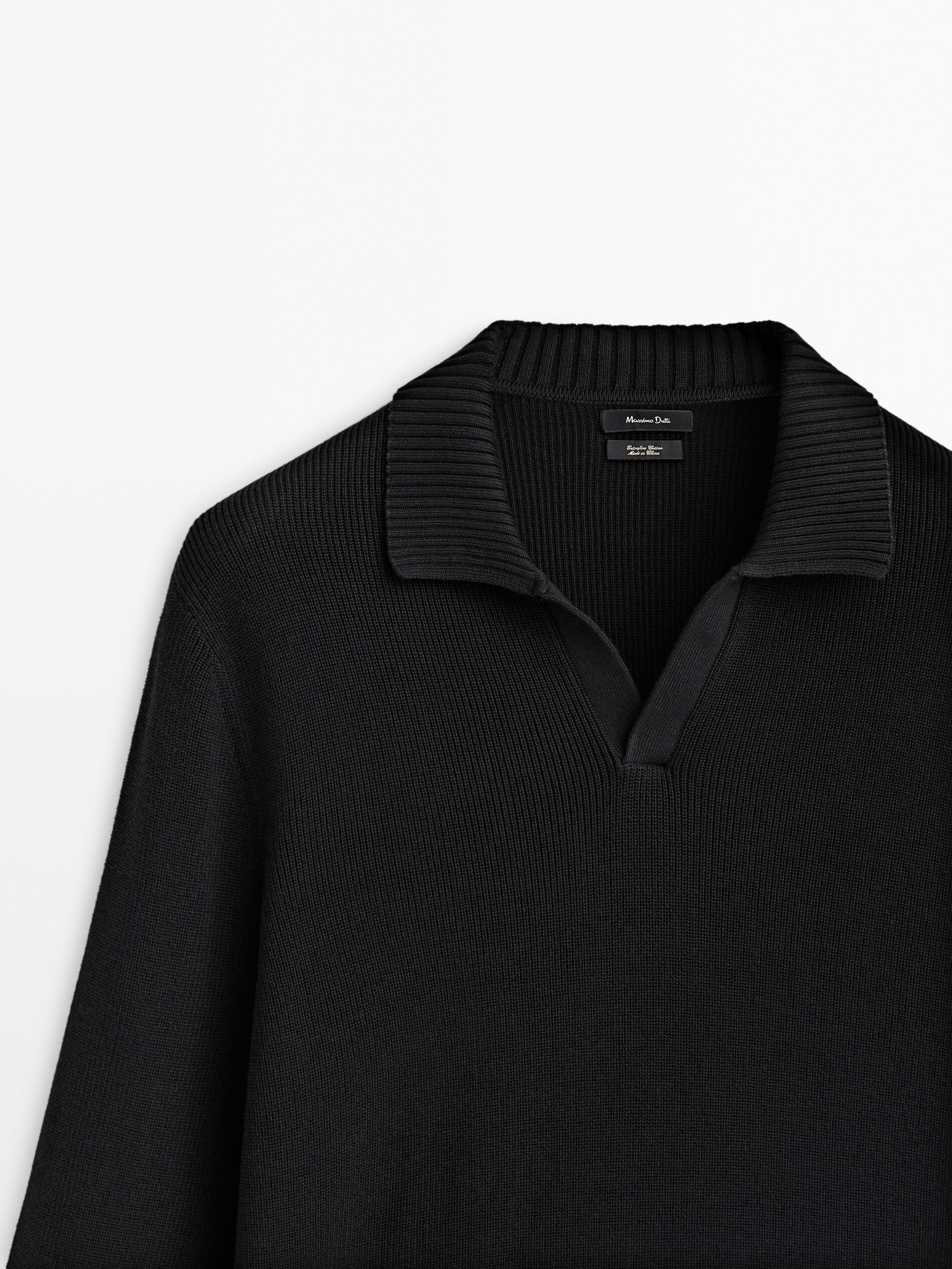 Ribbed polo collar textured knit sweater