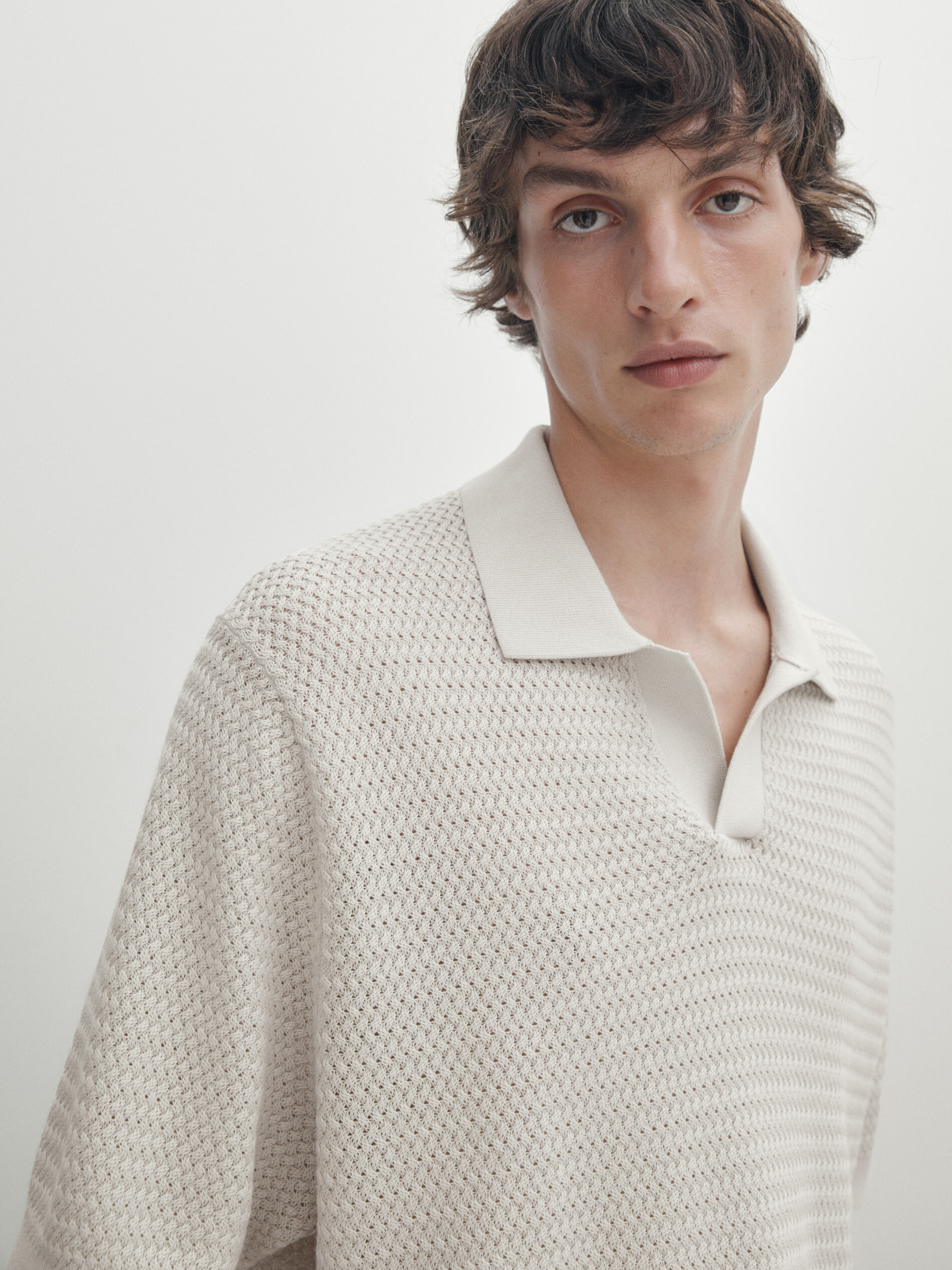 Textured short sleeve polo sweater