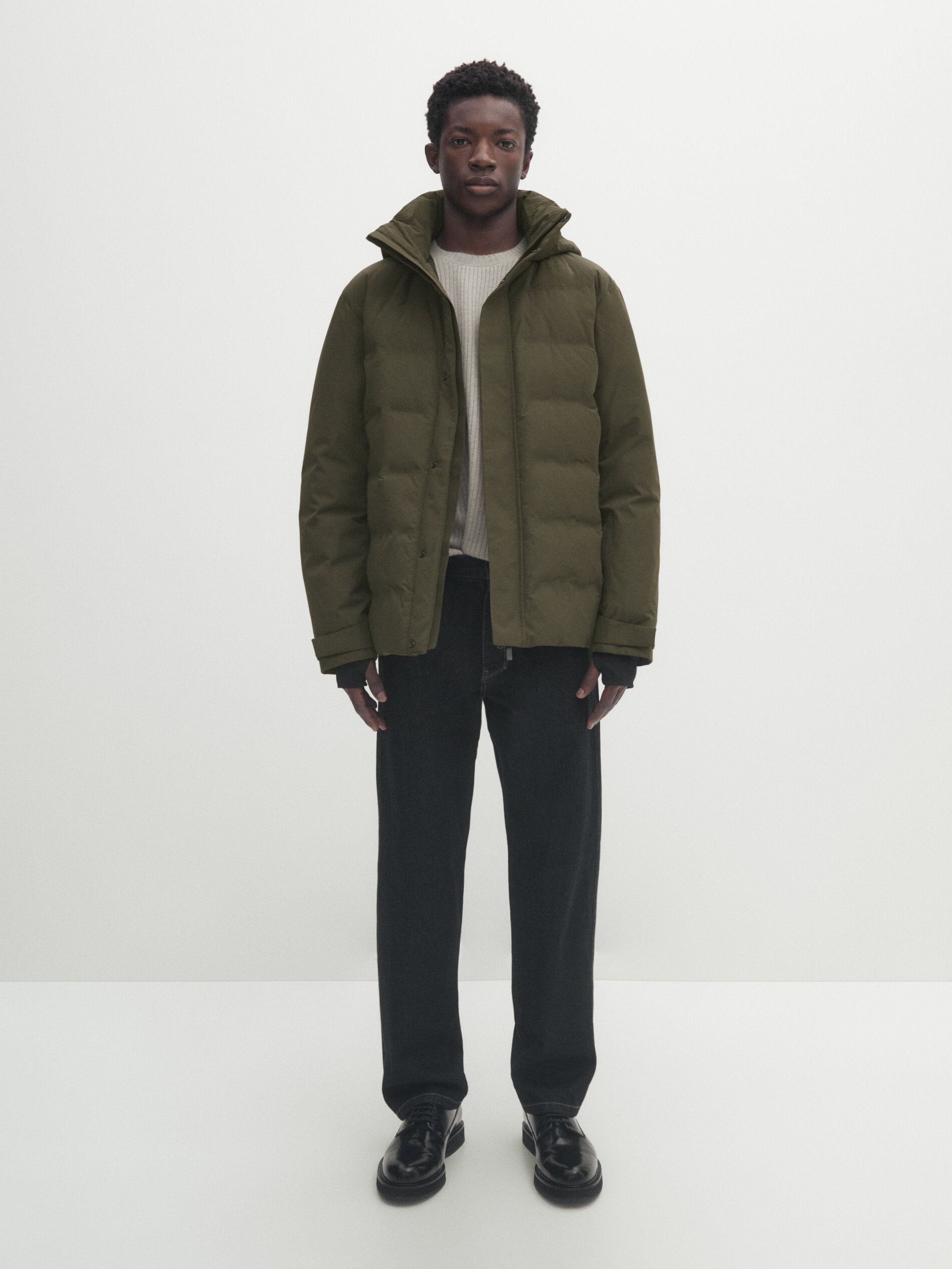 Technical heavy winter jacket with down and feather filling