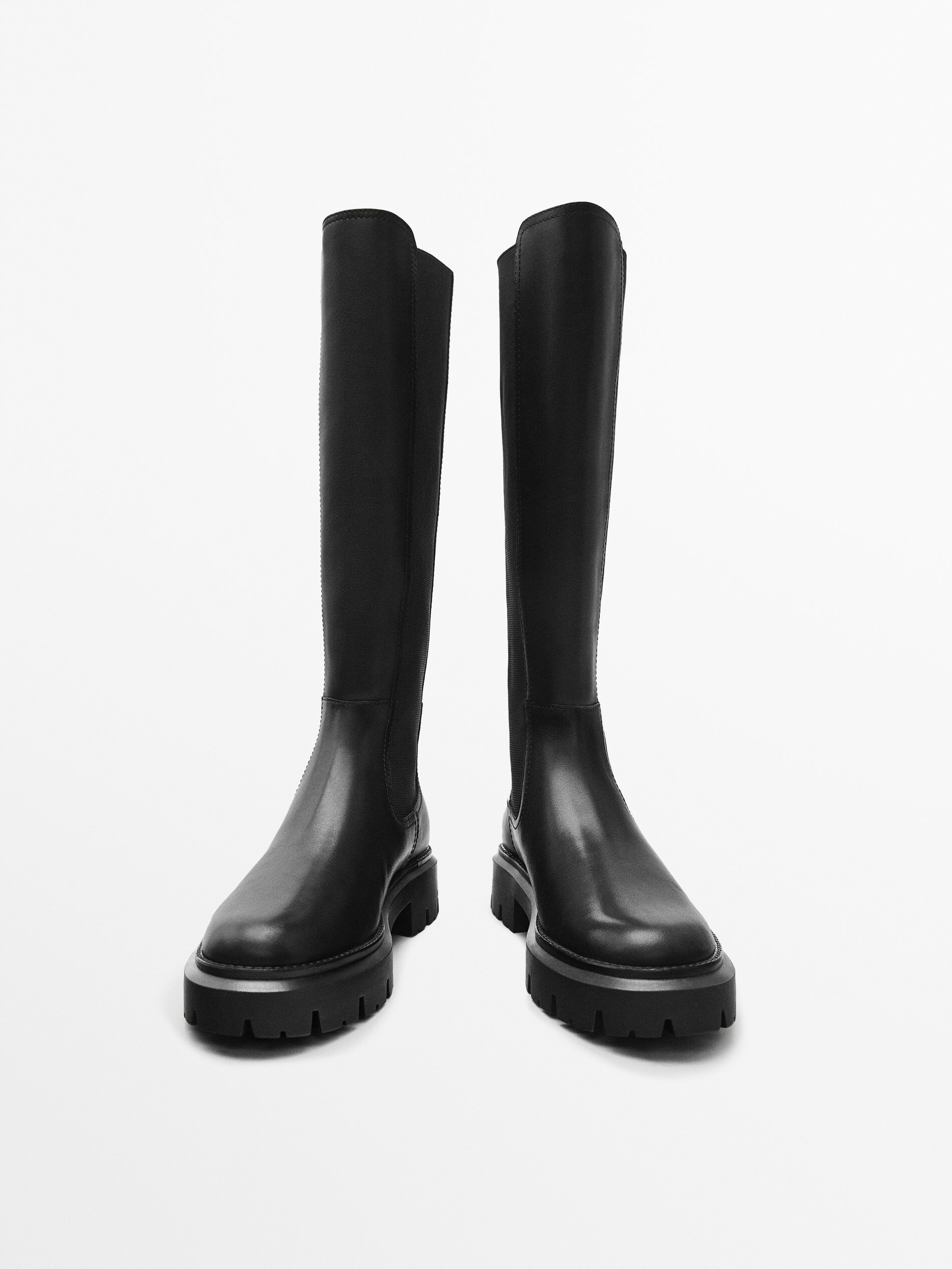 Flat track online sole ankle boots
