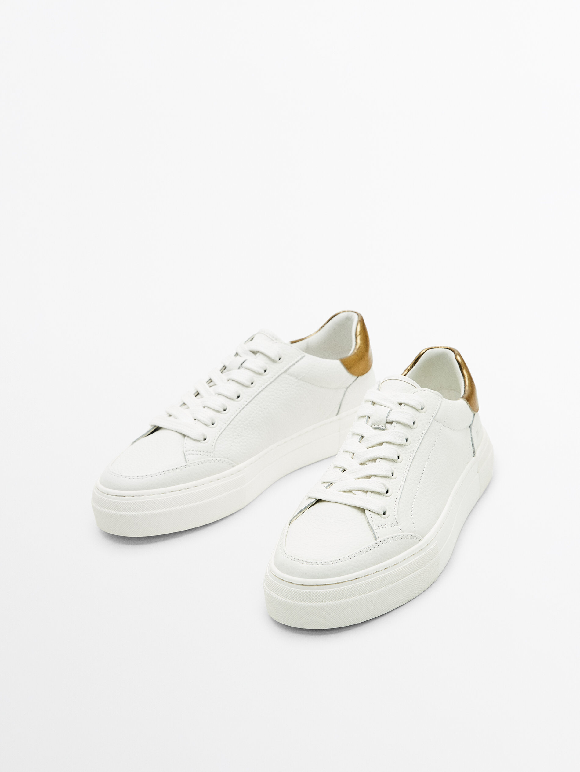 Leather trainers with laminated heel