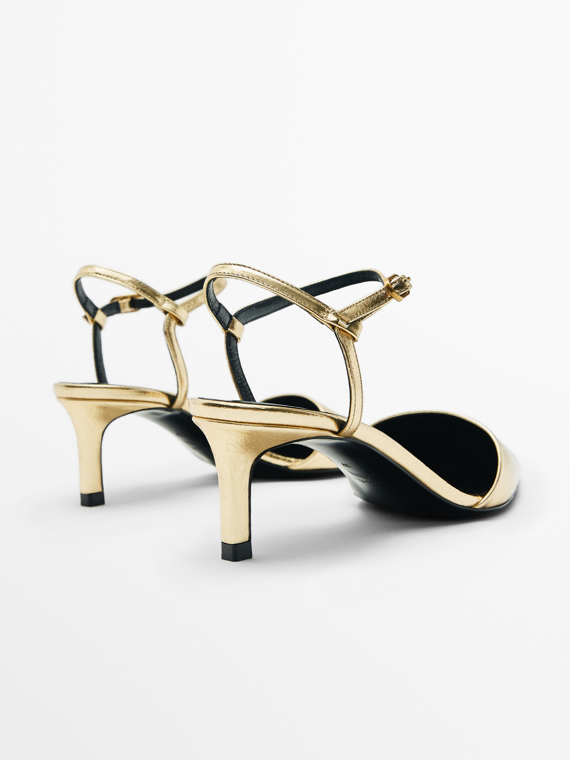 Open heel outlet mules