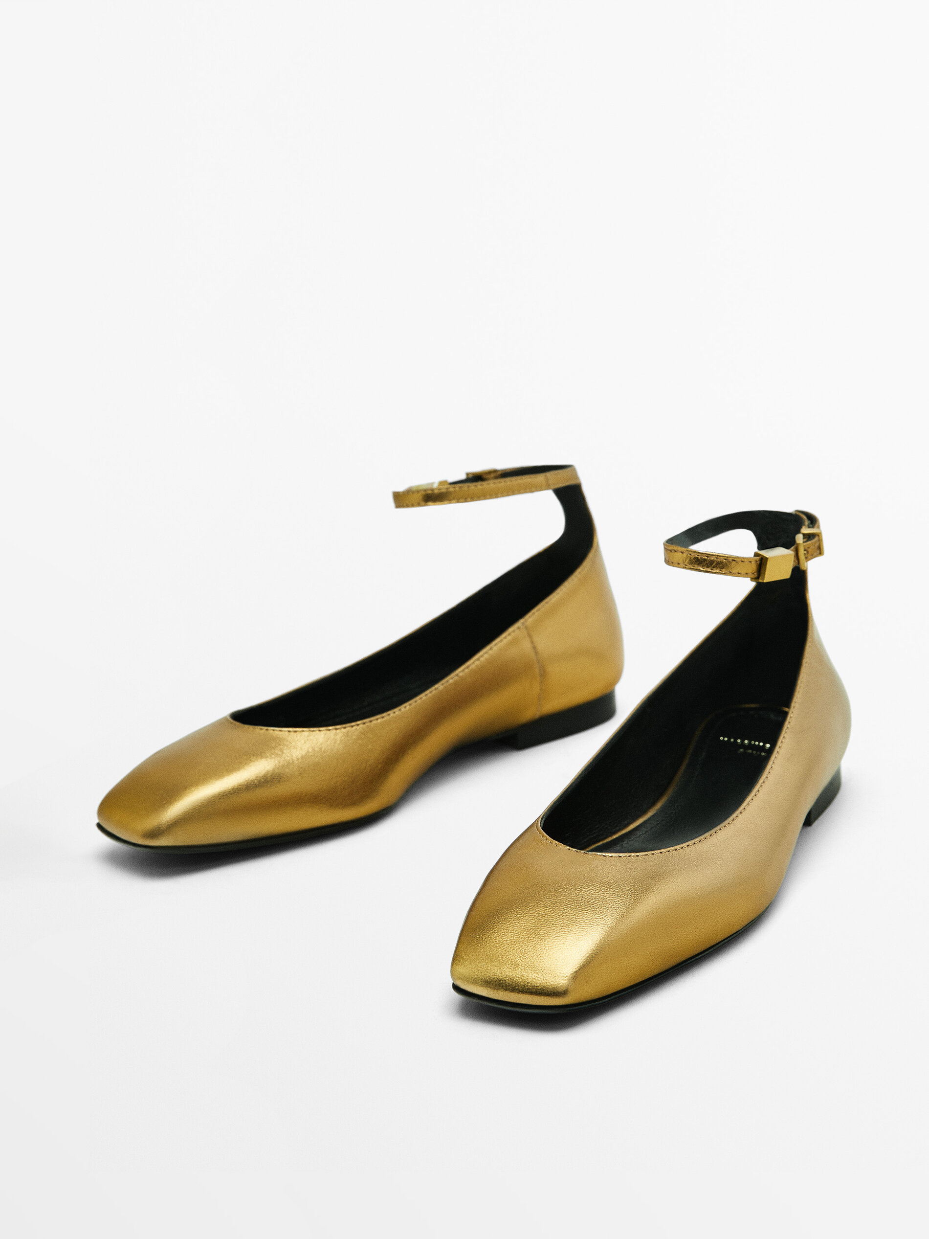 Gold leather shop flat shoes