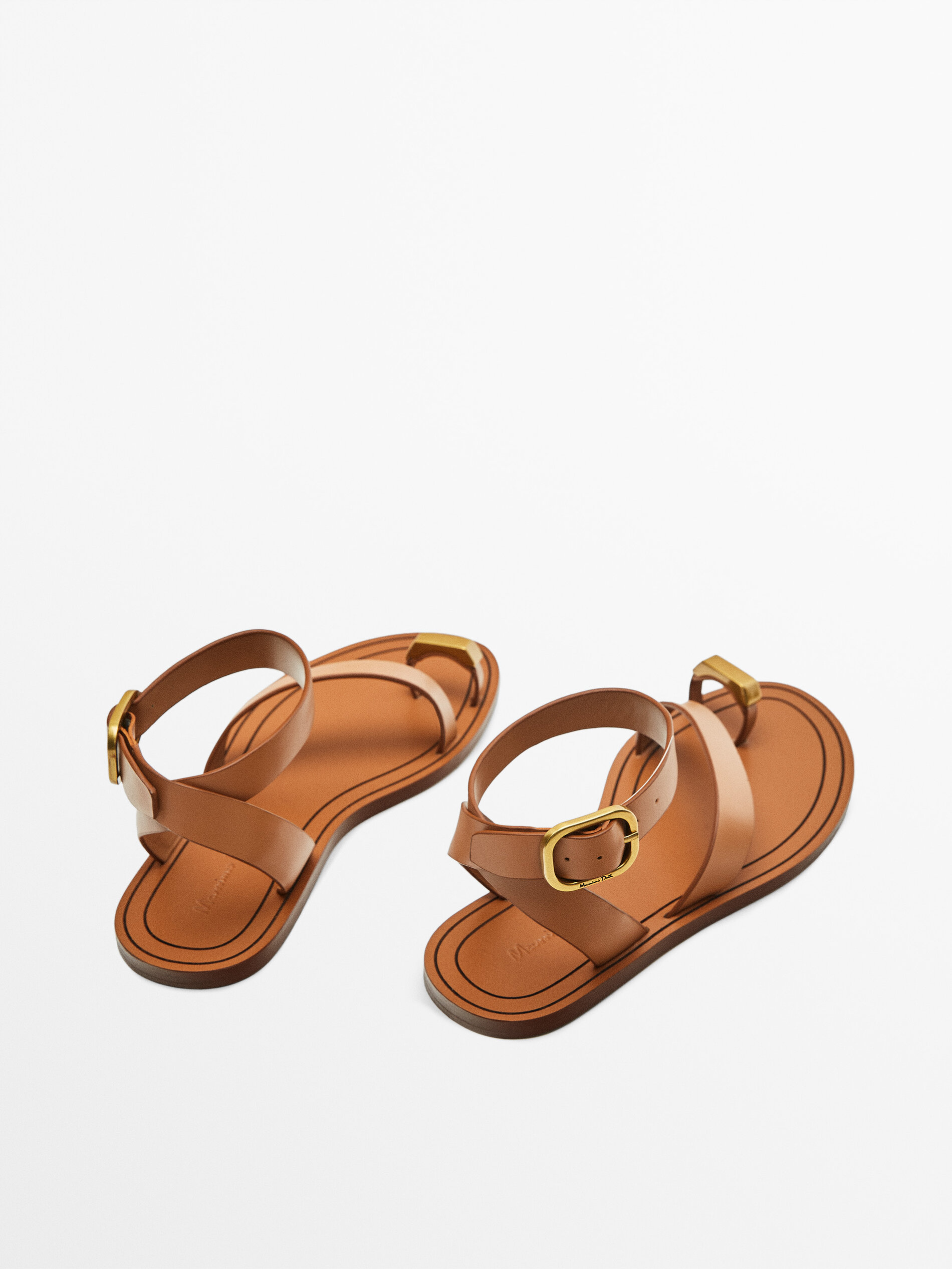 Sandali bassi in pelle con elemento metallizzato