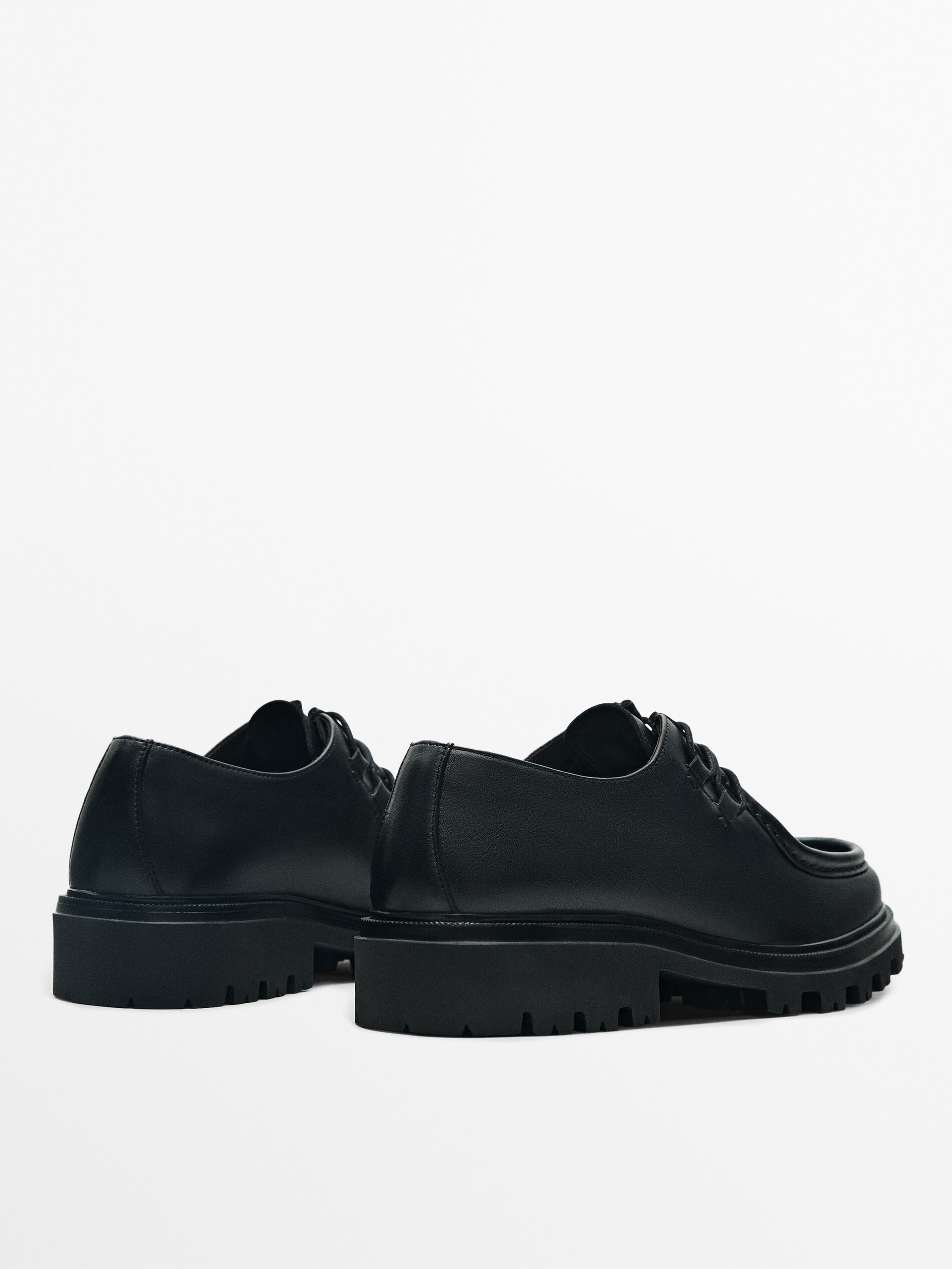 Black nappa moc toe shoes