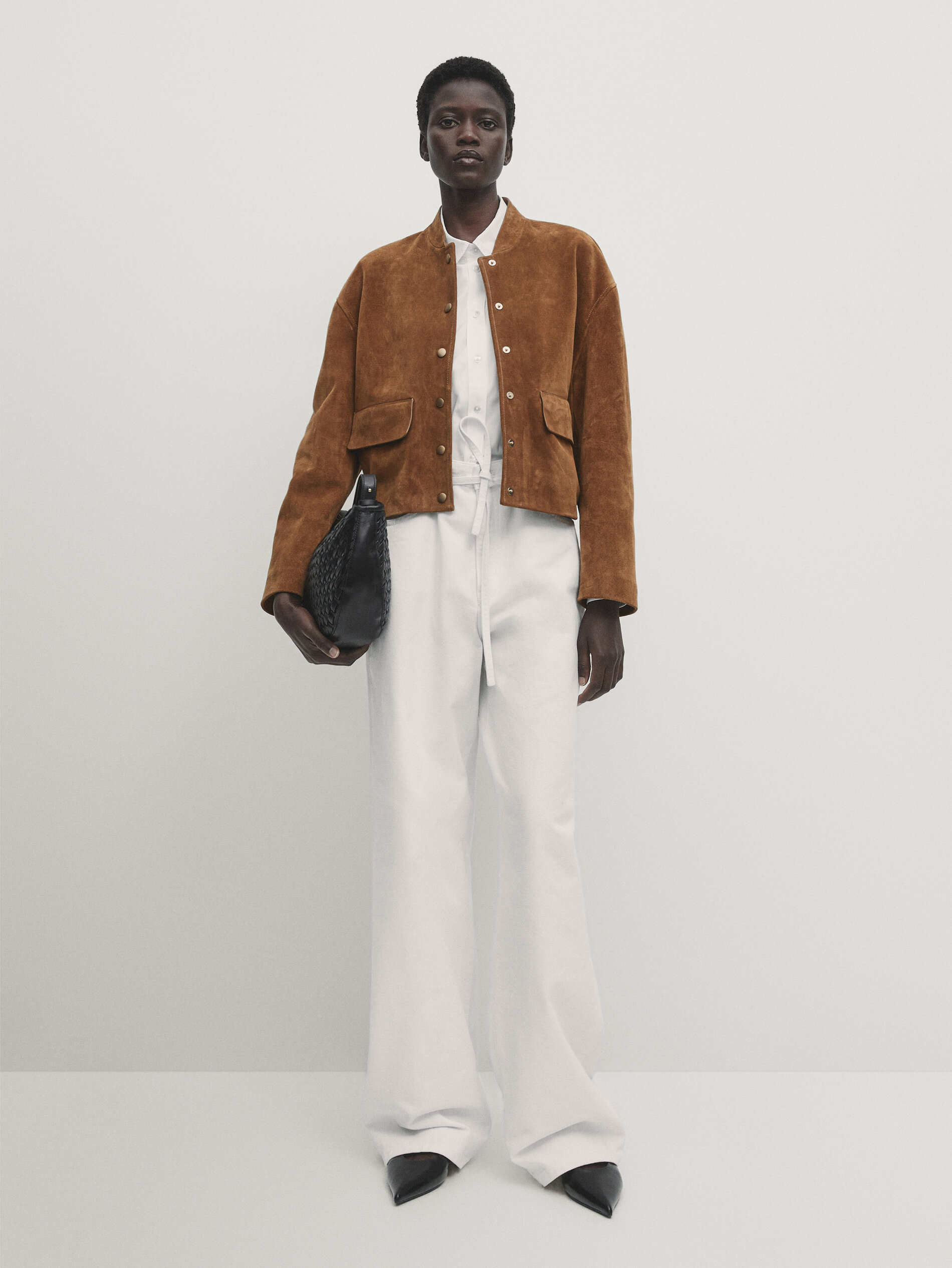 Suede leather bomber jacket with gold snap buttons