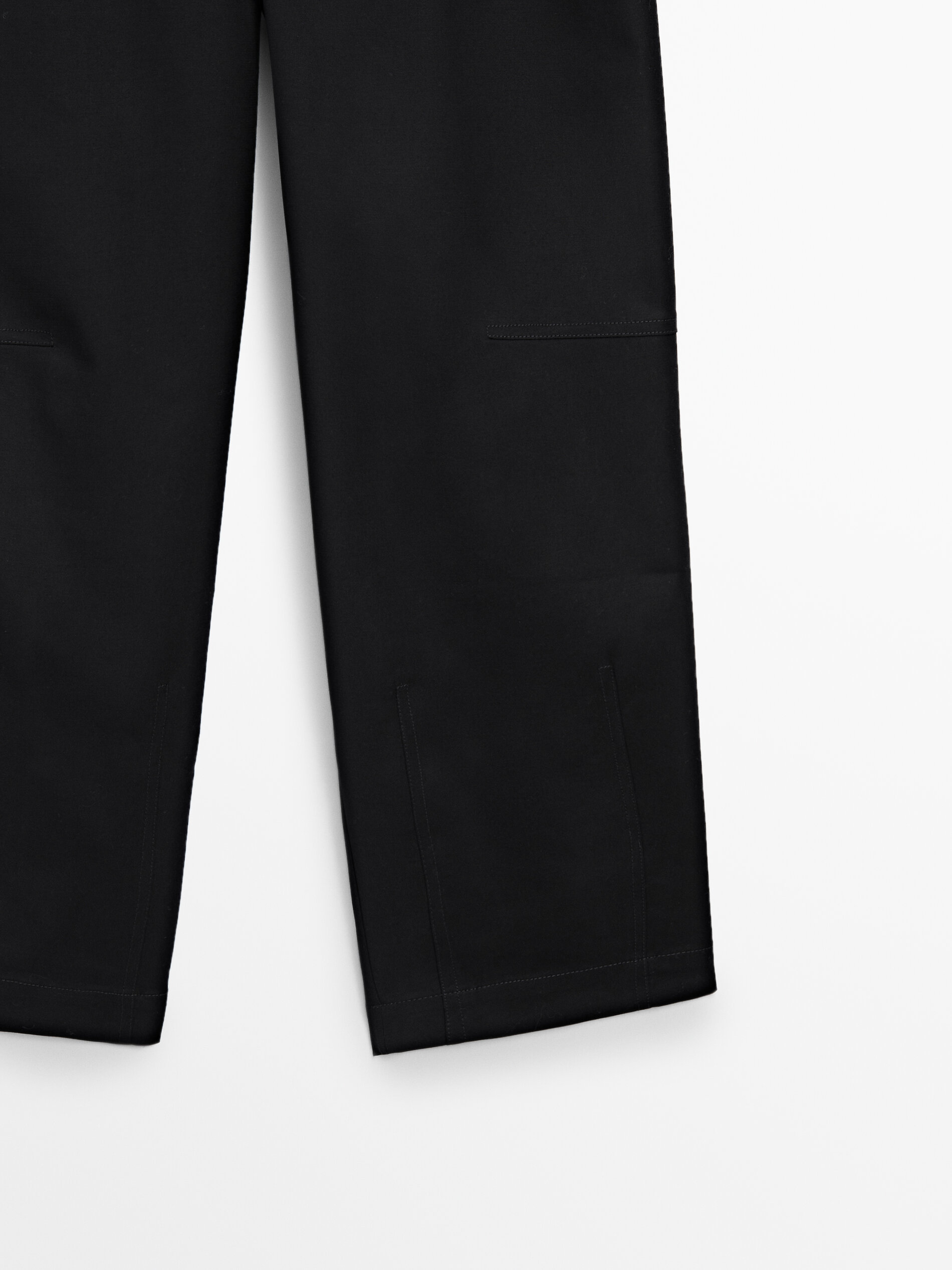 Black barrel fit trousers with belt