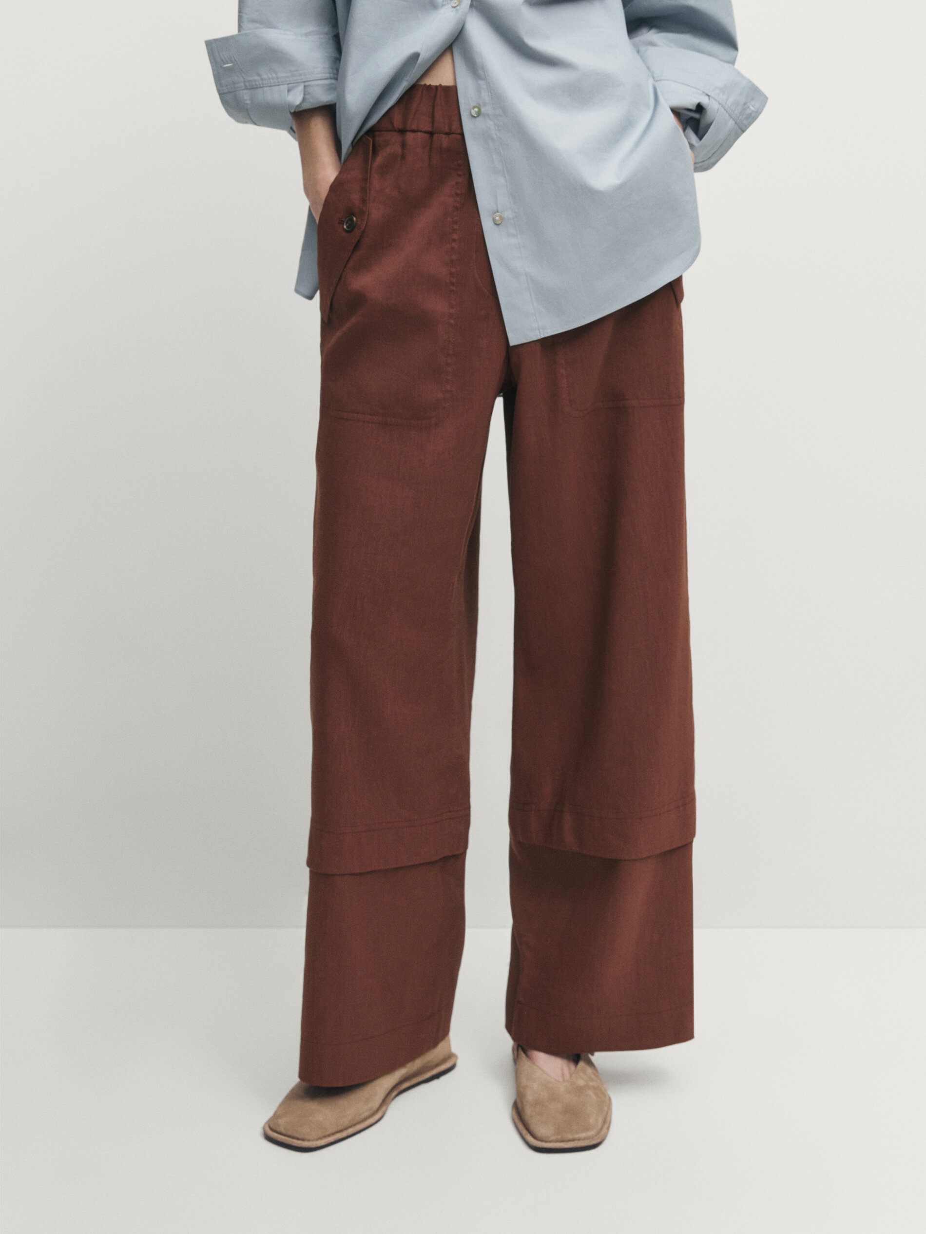 Tailored straight fit trousers with cuff details on the hem | SOTOS NAKIS