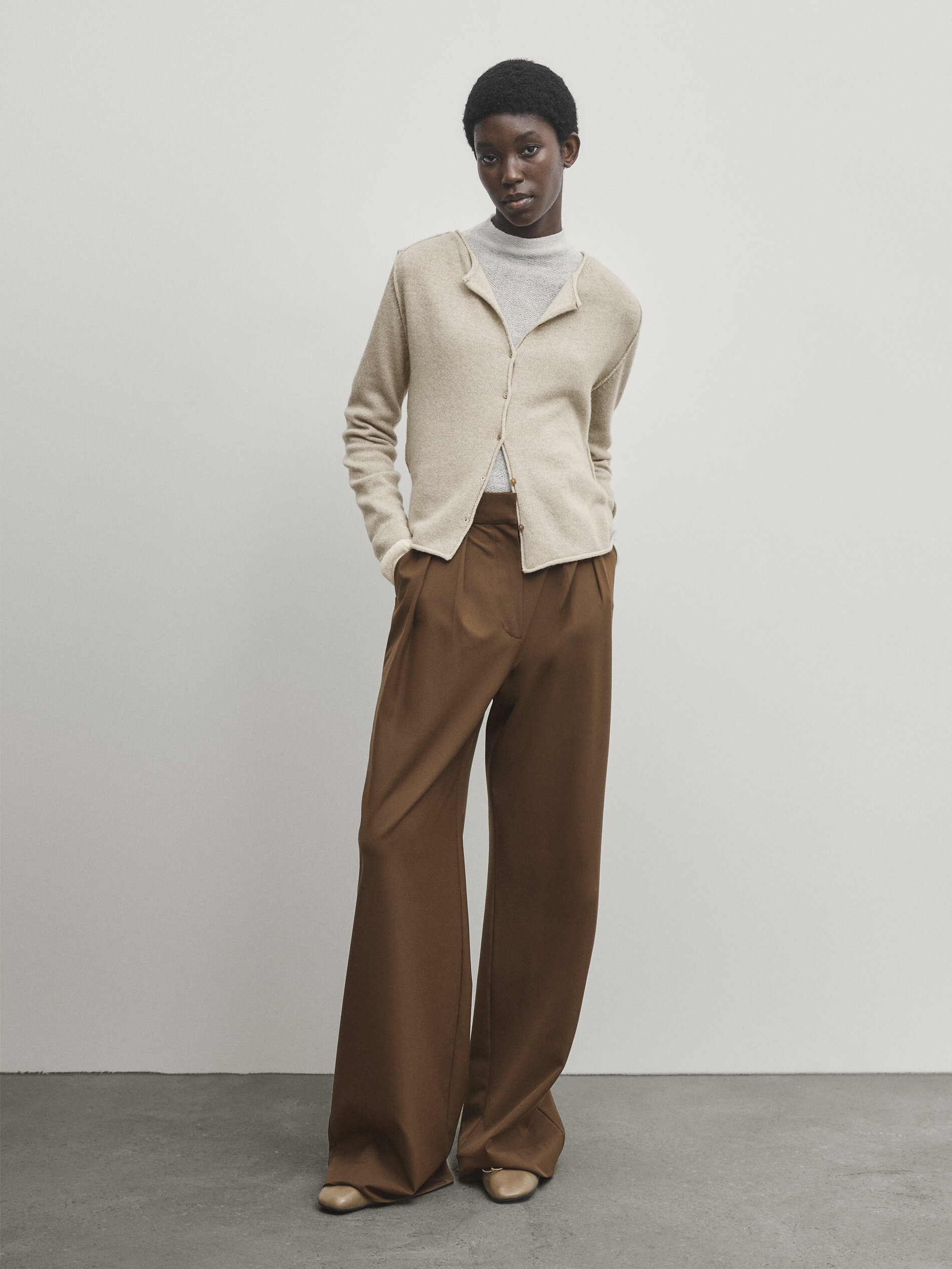 Buttoned knit cardigan with plated finish Beige Sweaters And