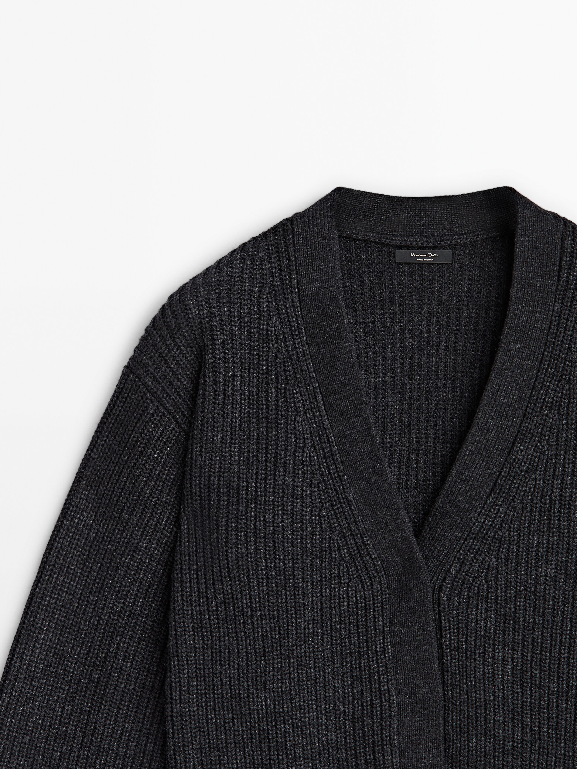 White wool cardigan store sweater
