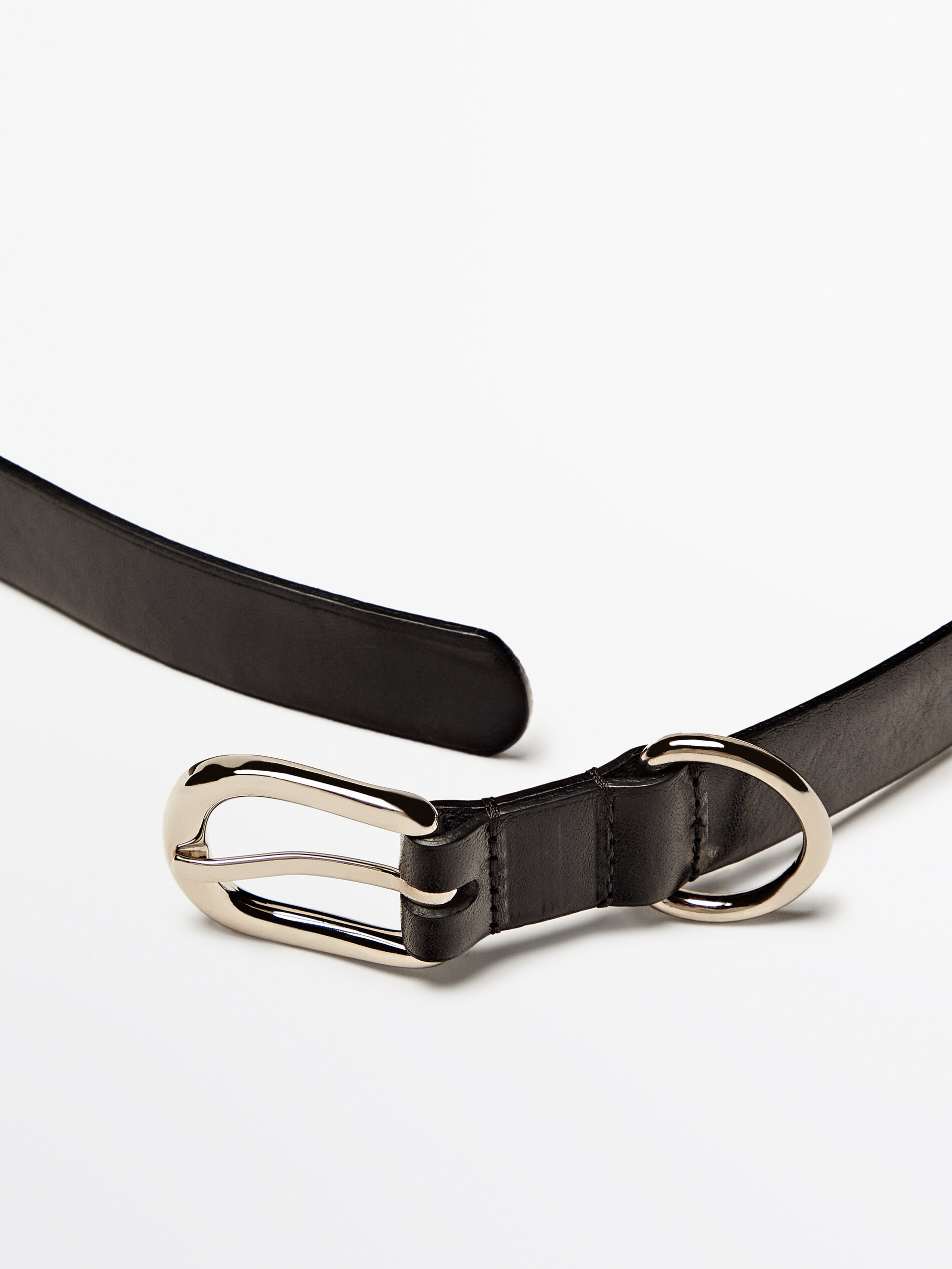 Leather belt with metal loop
