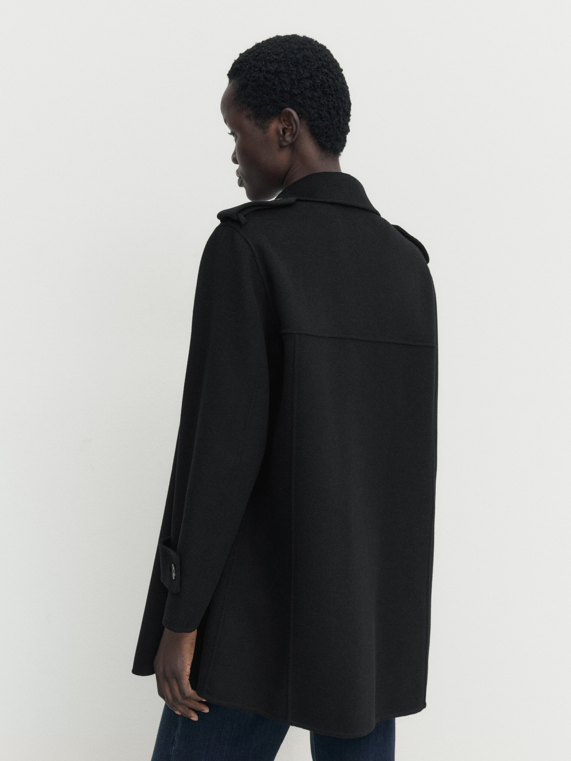 White top black coat