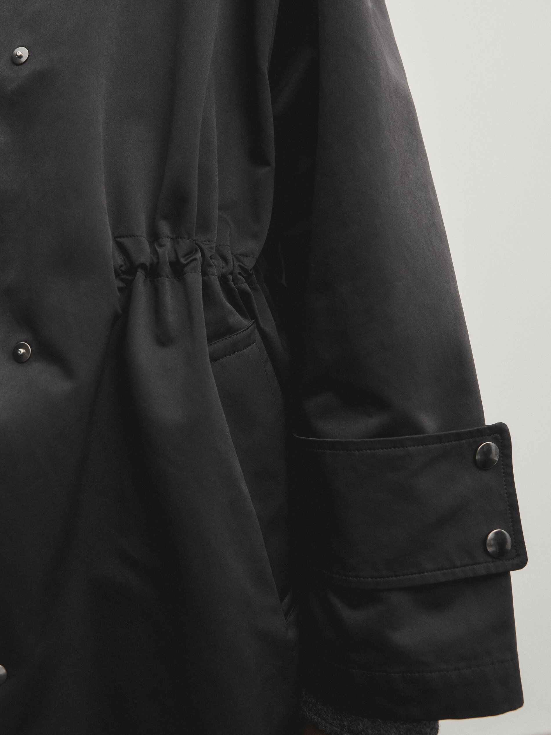 Long parka with quilted interior and adjustable waist Black